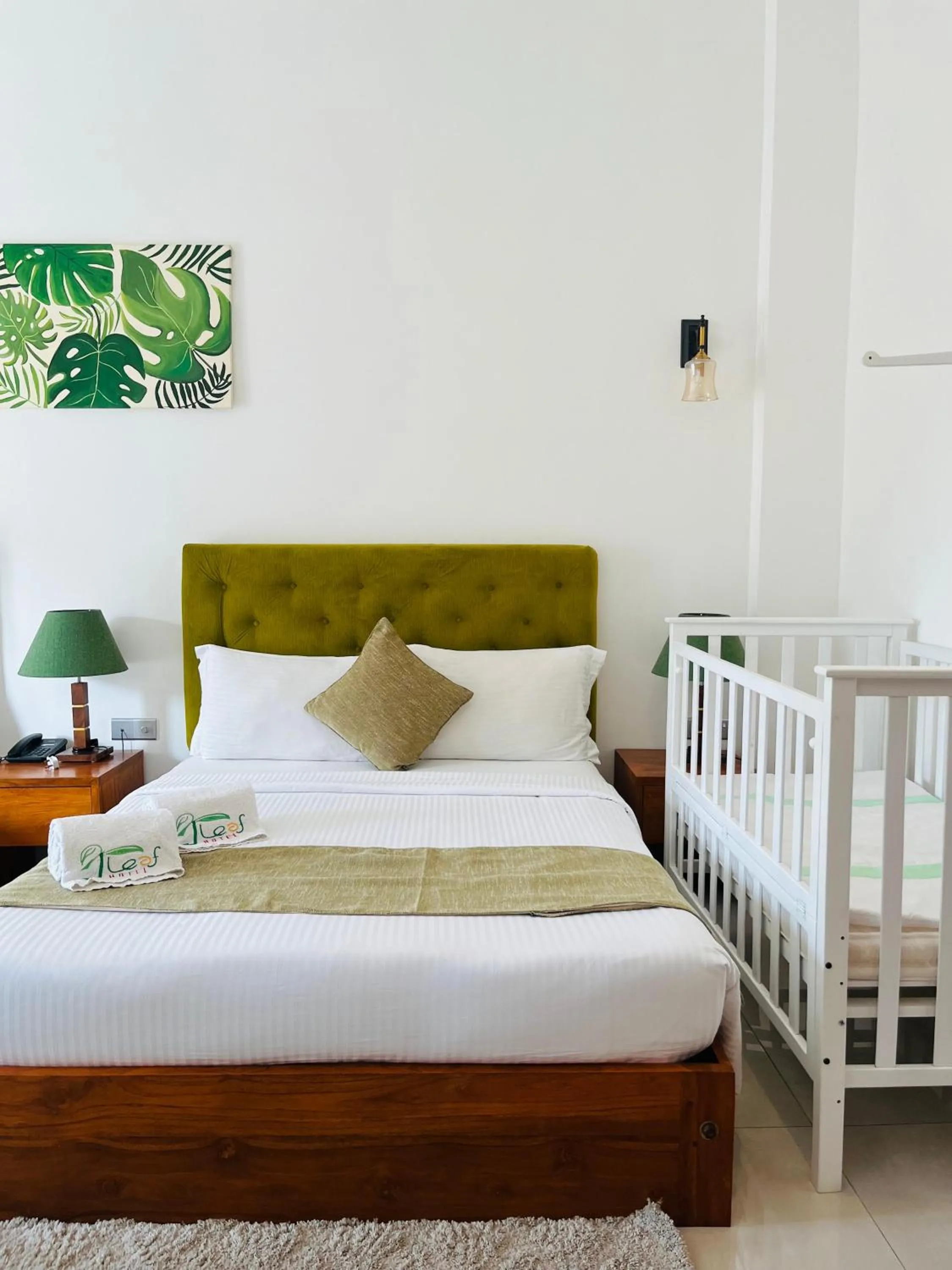 Bed in J leaf Hotel by Blue Bird