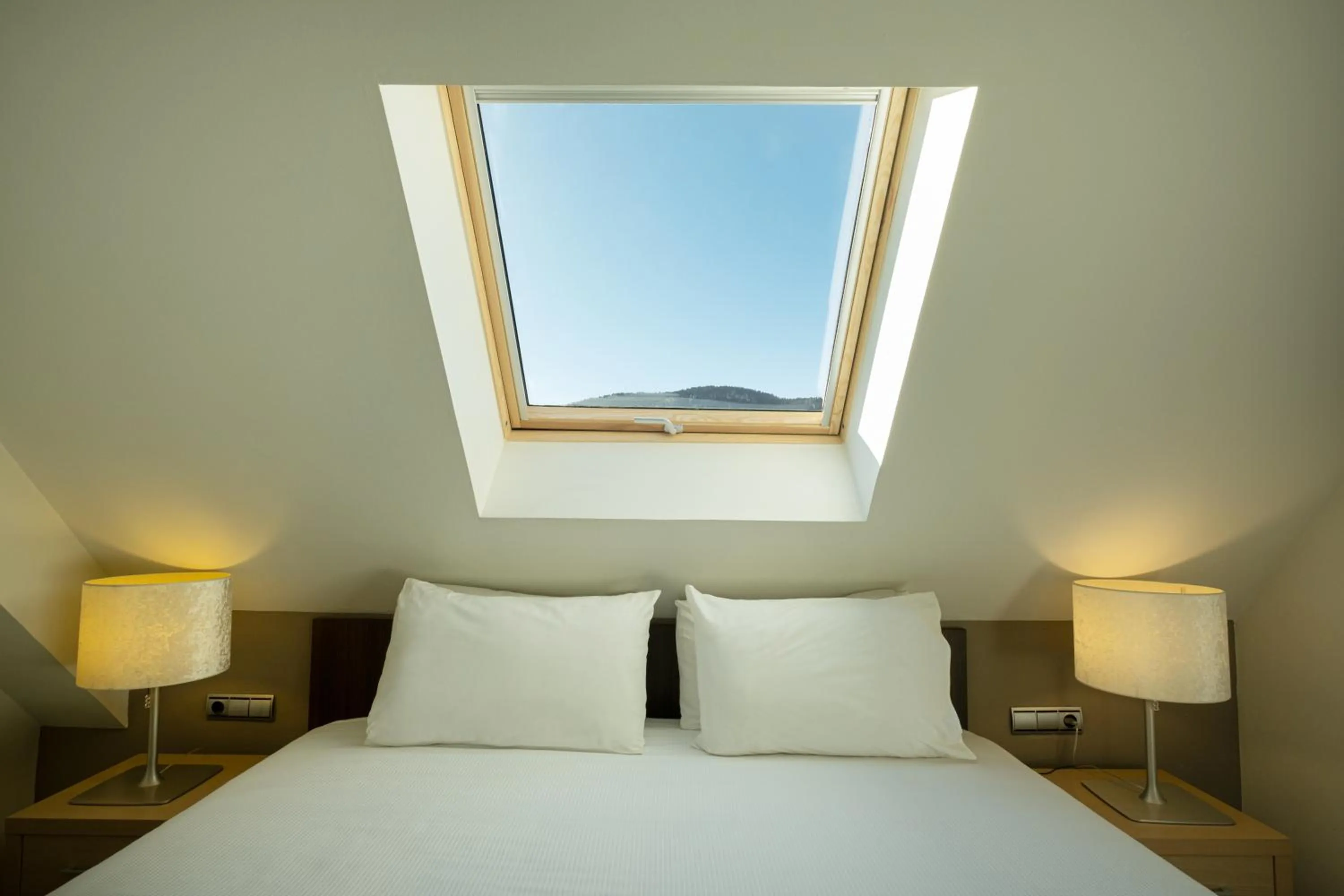 Bed in Eurostars Royal Tanau