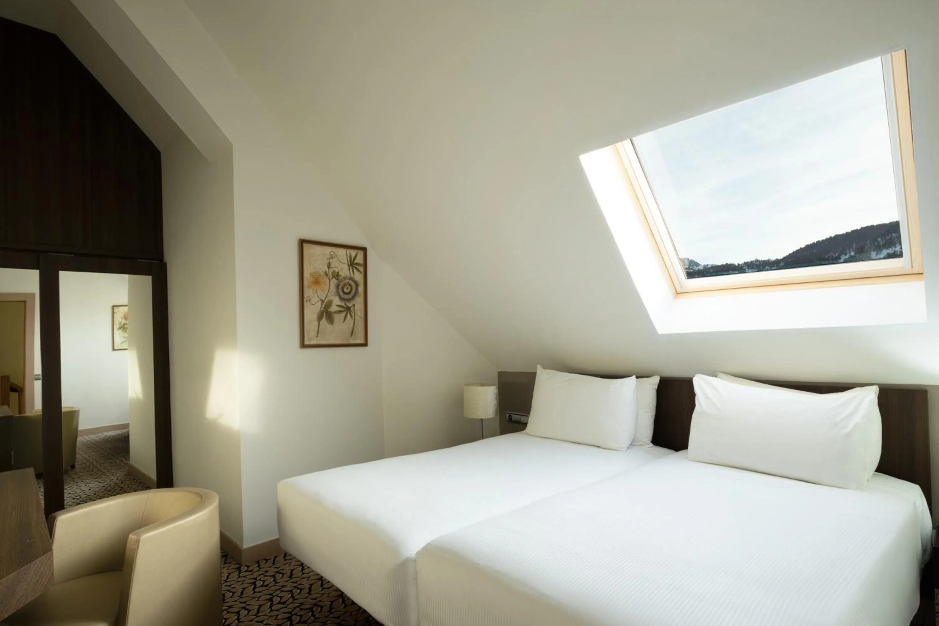 Bed in Eurostars Royal Tanau