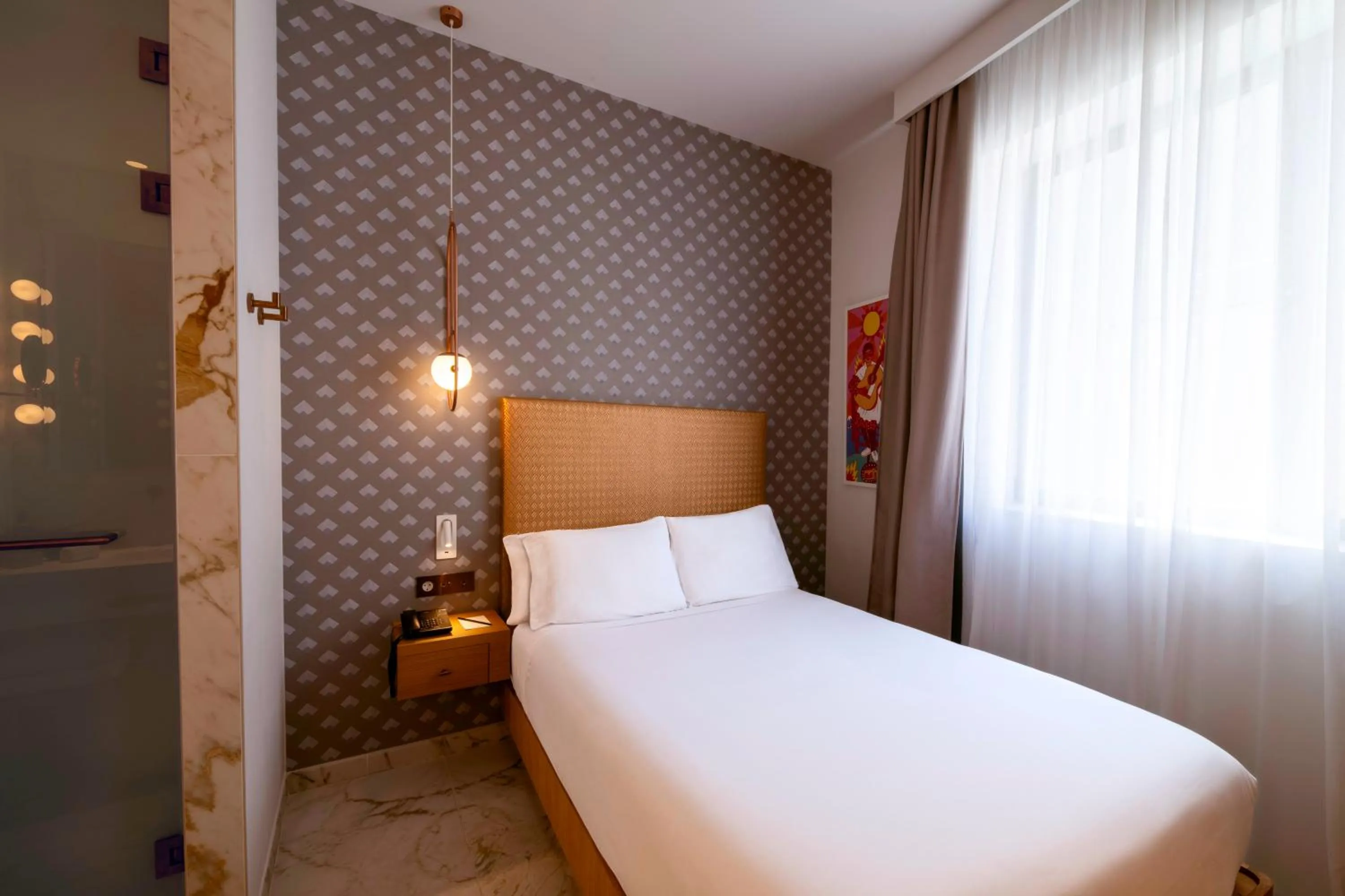 Bed in UMusic Hotel Madrid