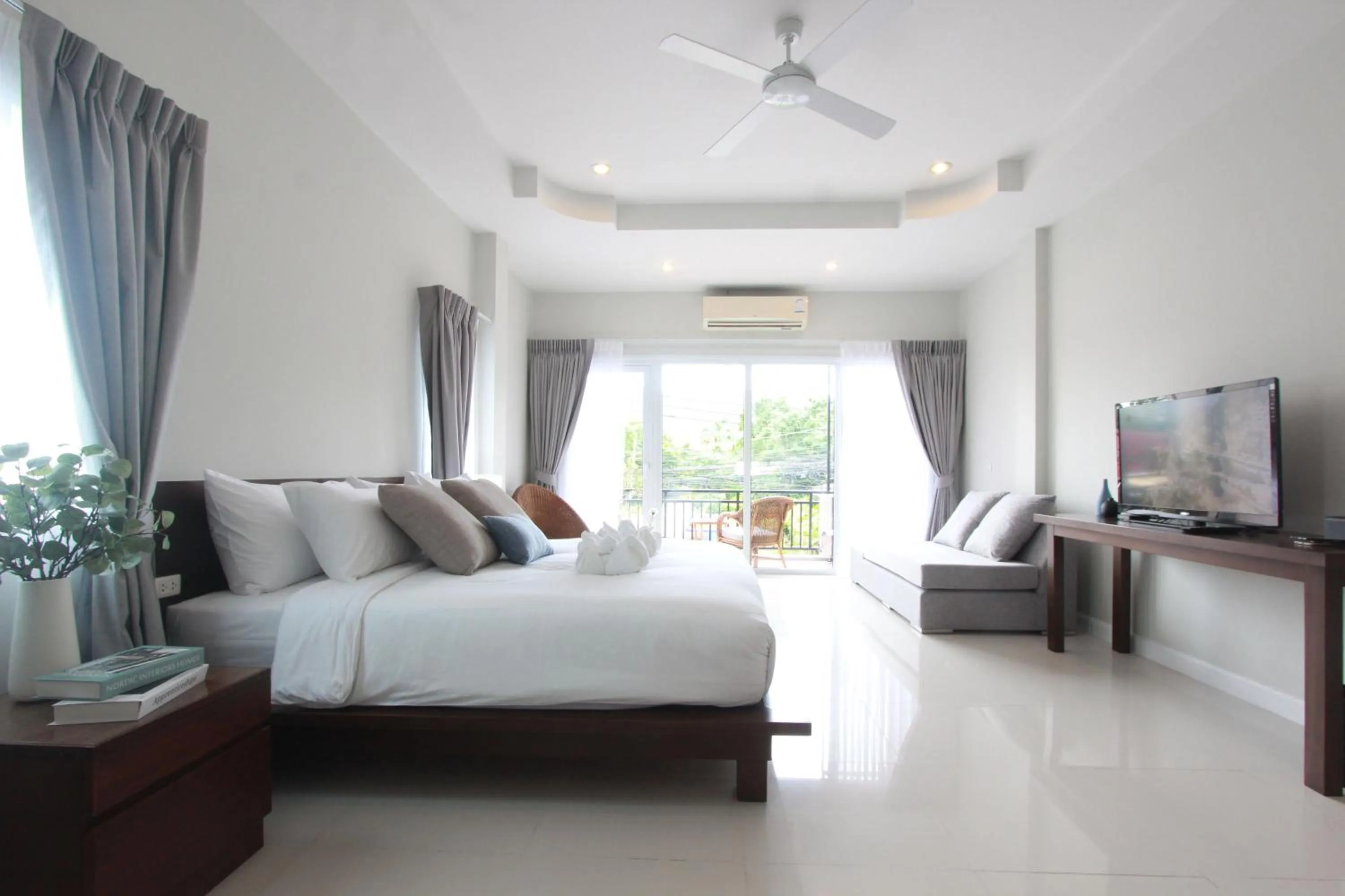 Bed in The Langstan Suites