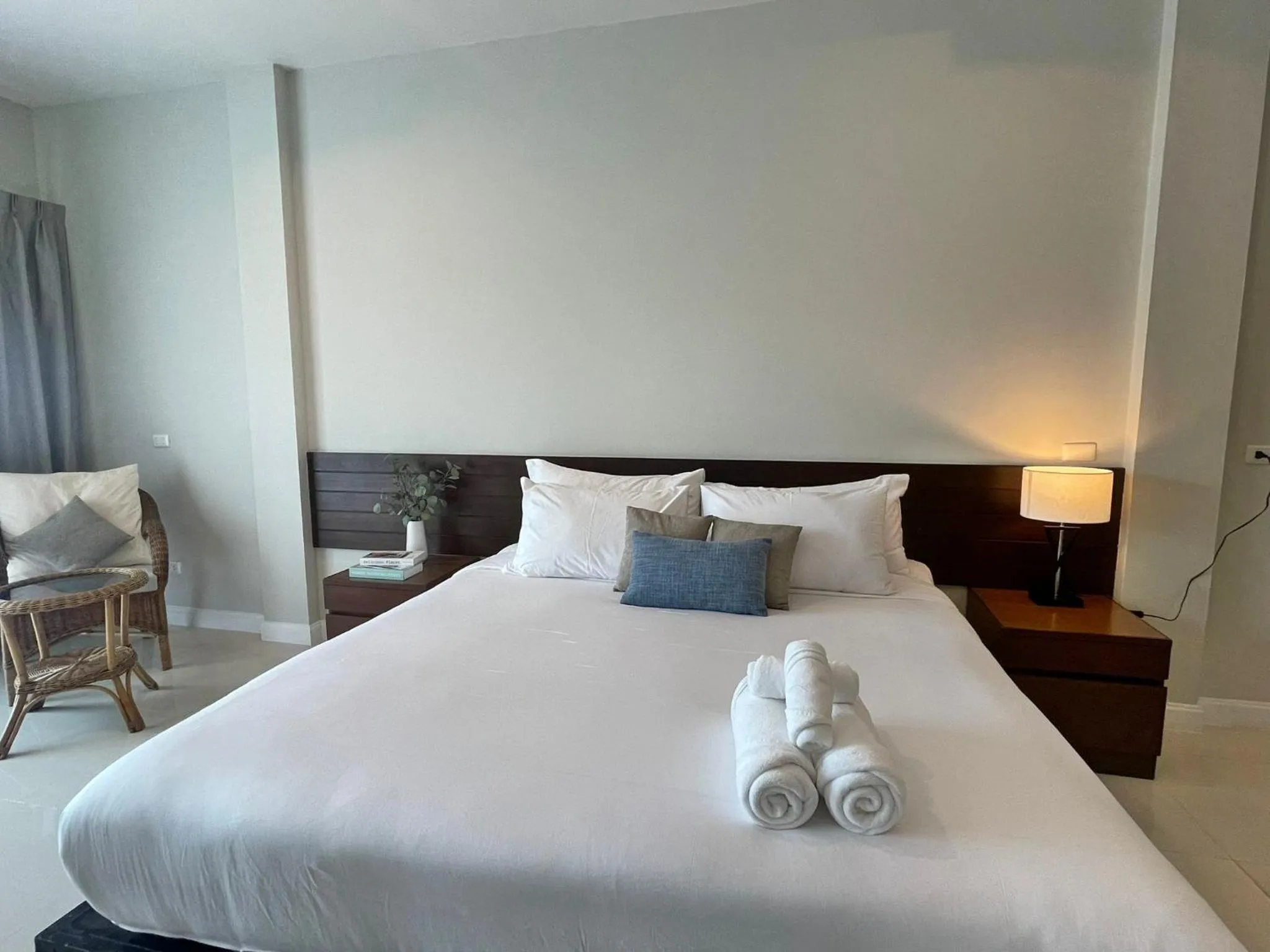 Bed in The Langstan Suites