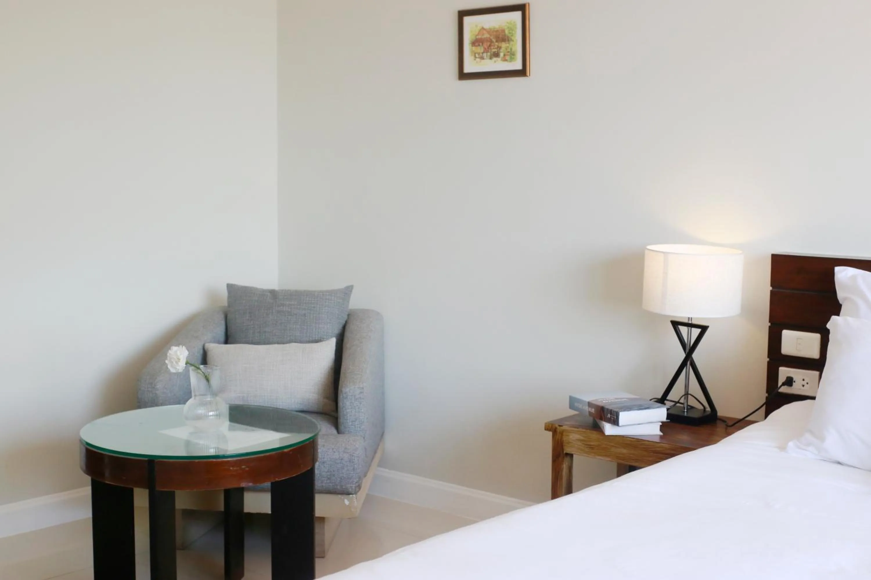 Bed in The Langstan Suites