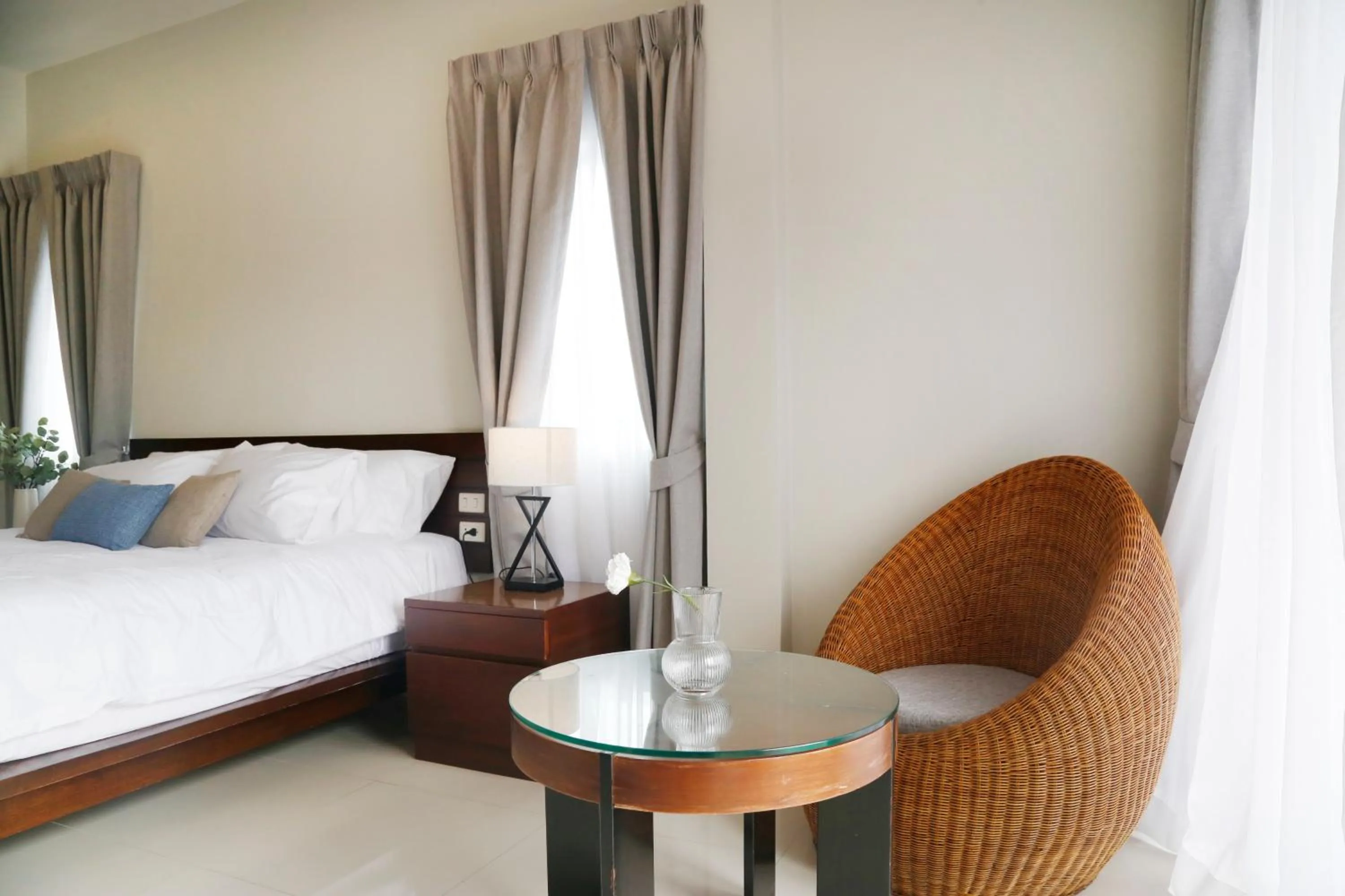 Bed in The Langstan Suites