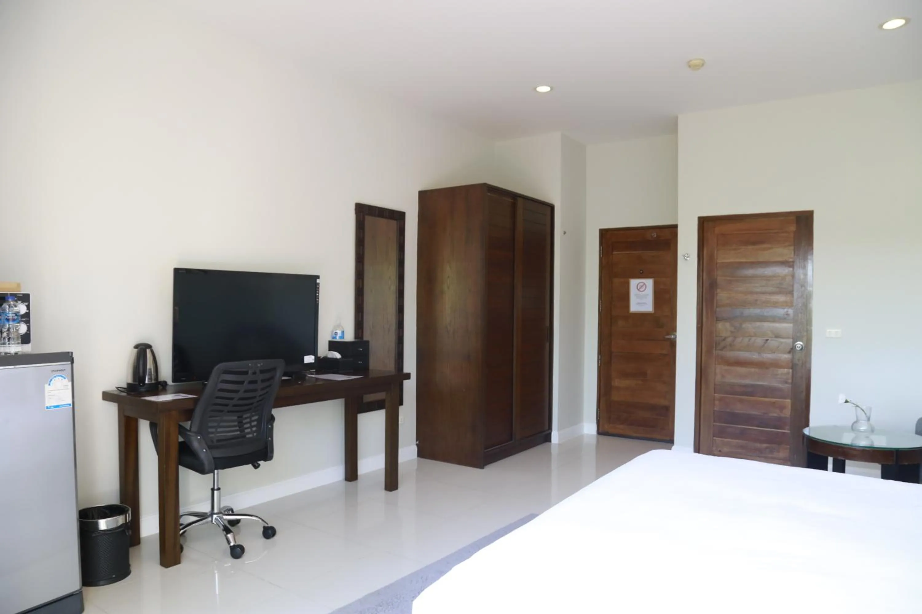 Bed in The Langstan Suites