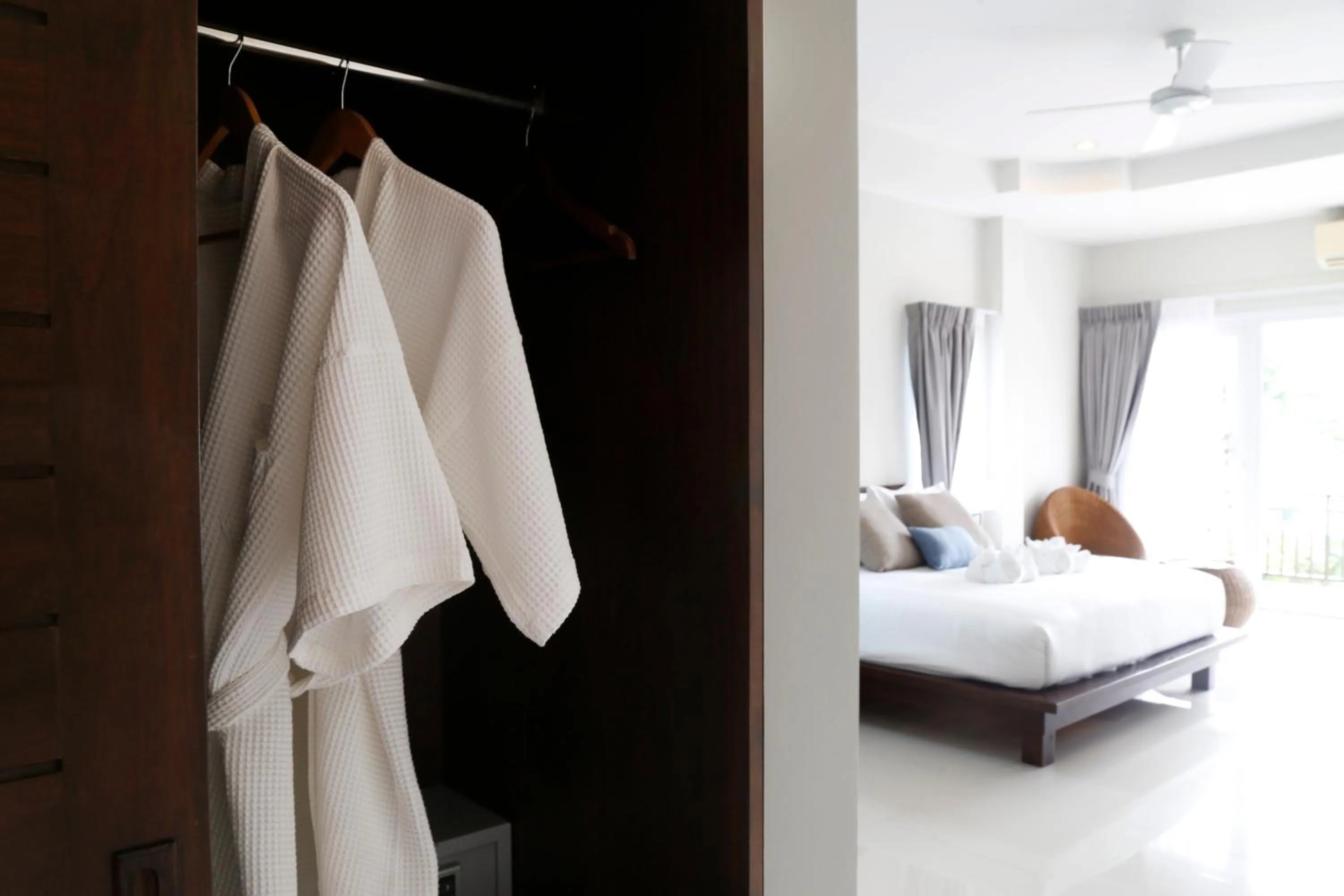 Bed in The Langstan Suites