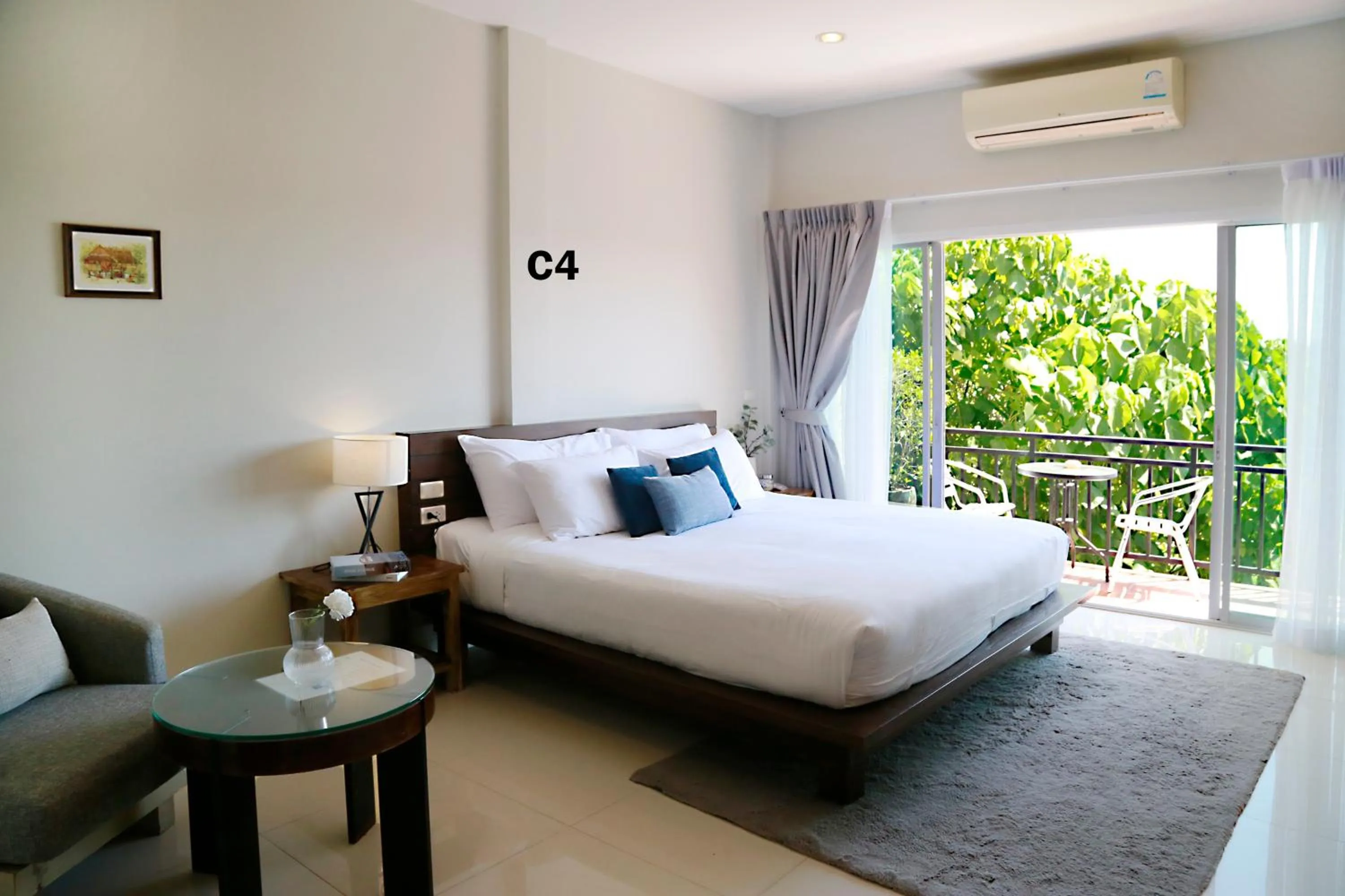 Bed in The Langstan Suites