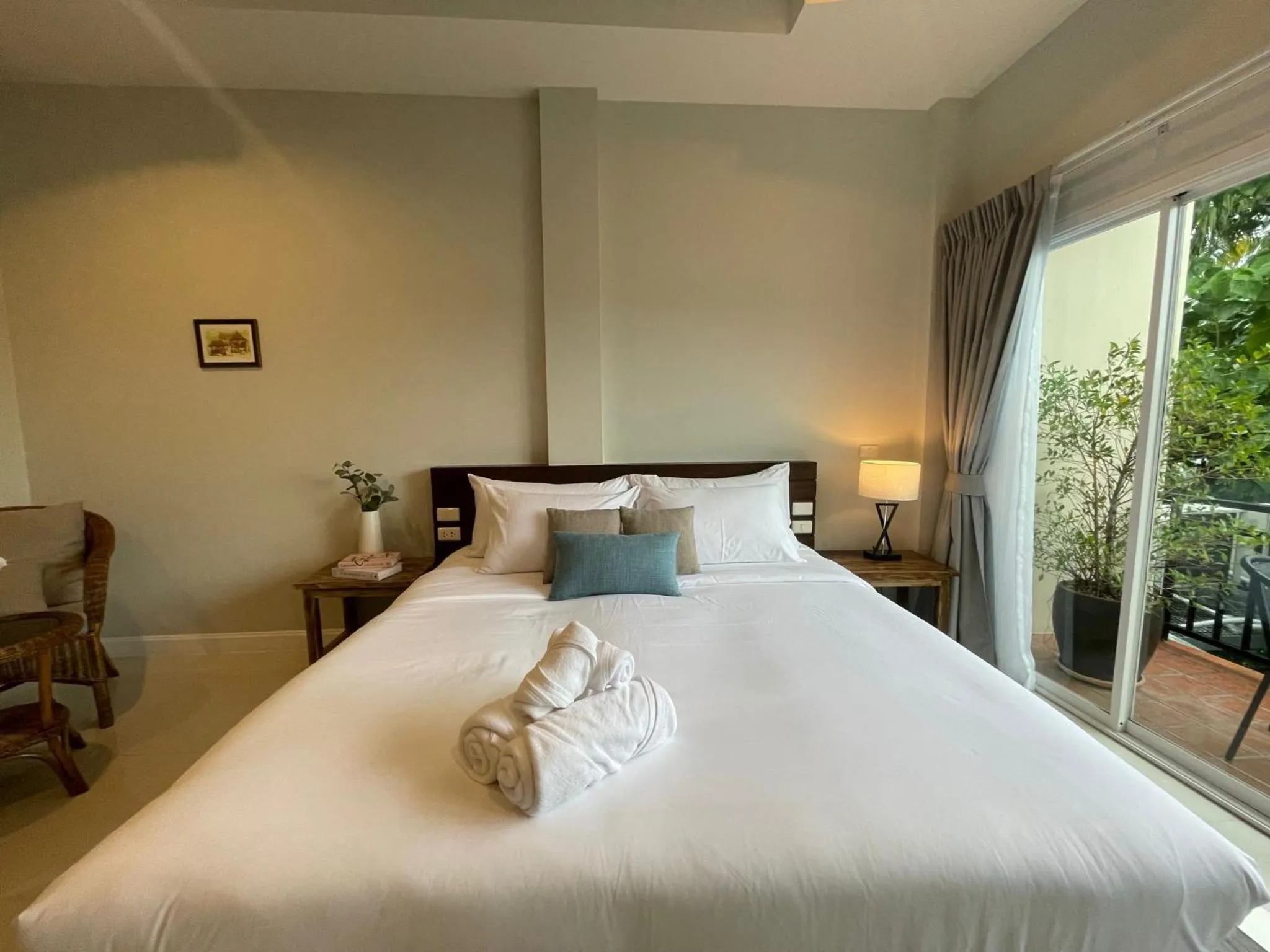 Bed in The Langstan Suites