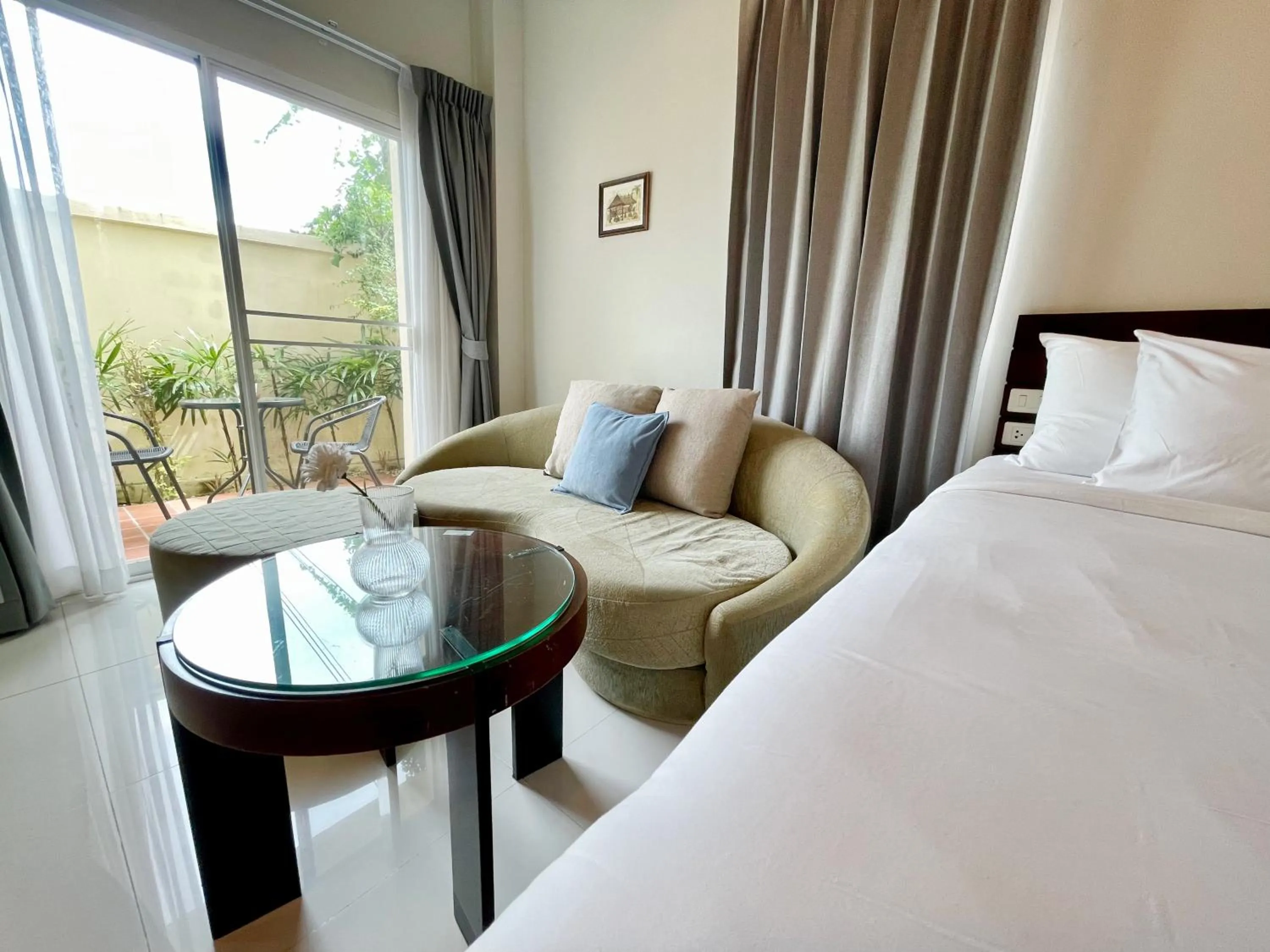 Bed in The Langstan Suites