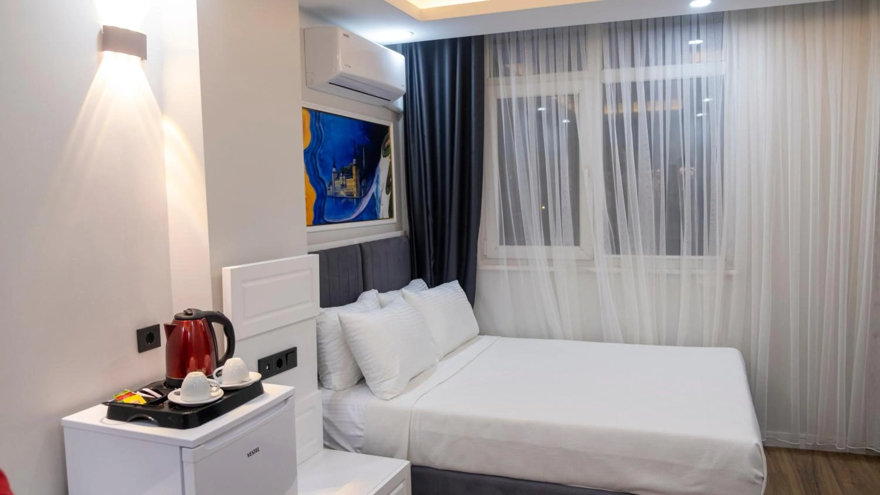 Coffee/tea facilities, Bed in Hodegon Suite Hotel