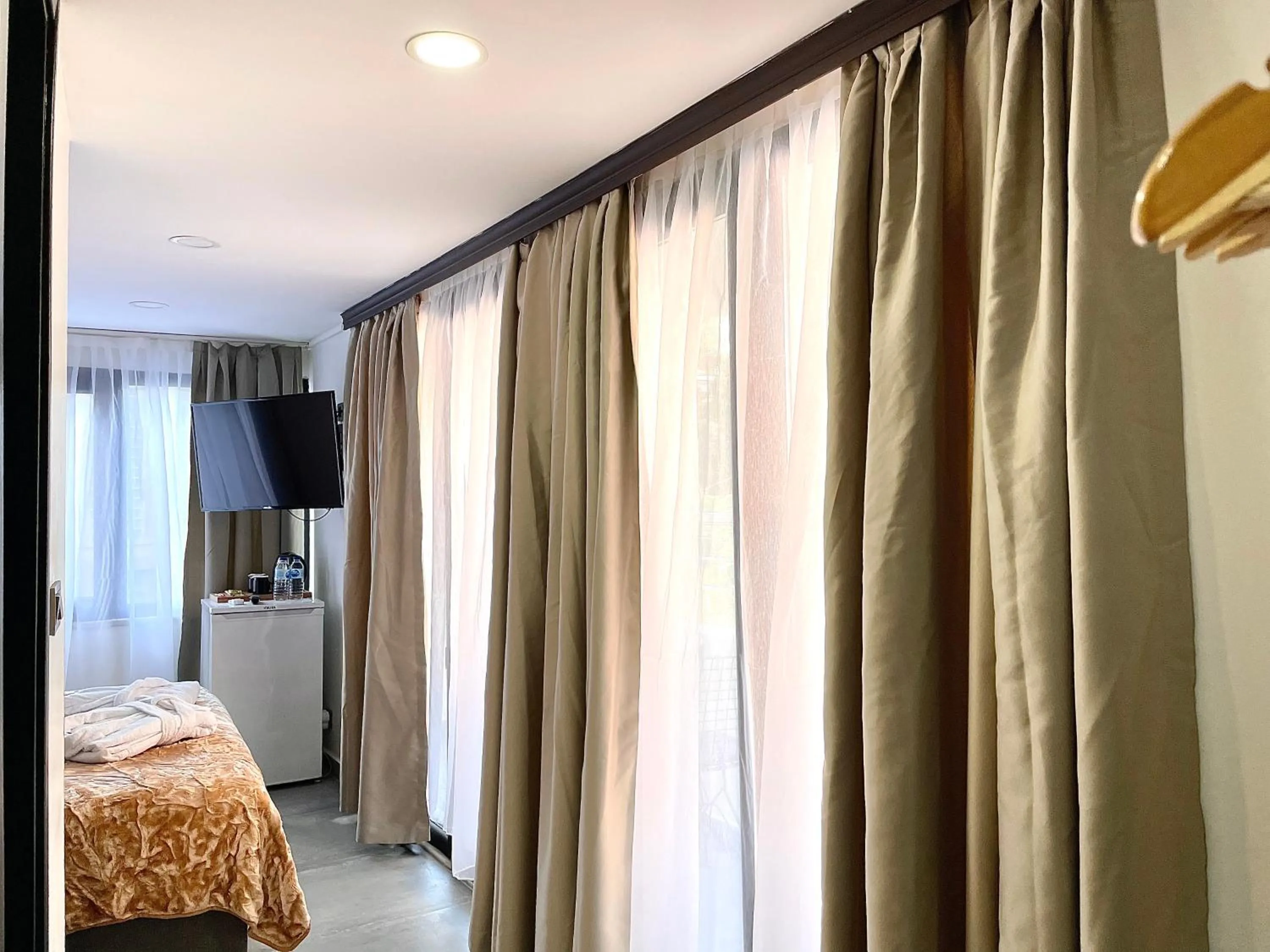 TV and multimedia, Bed in Mates Port Hotel