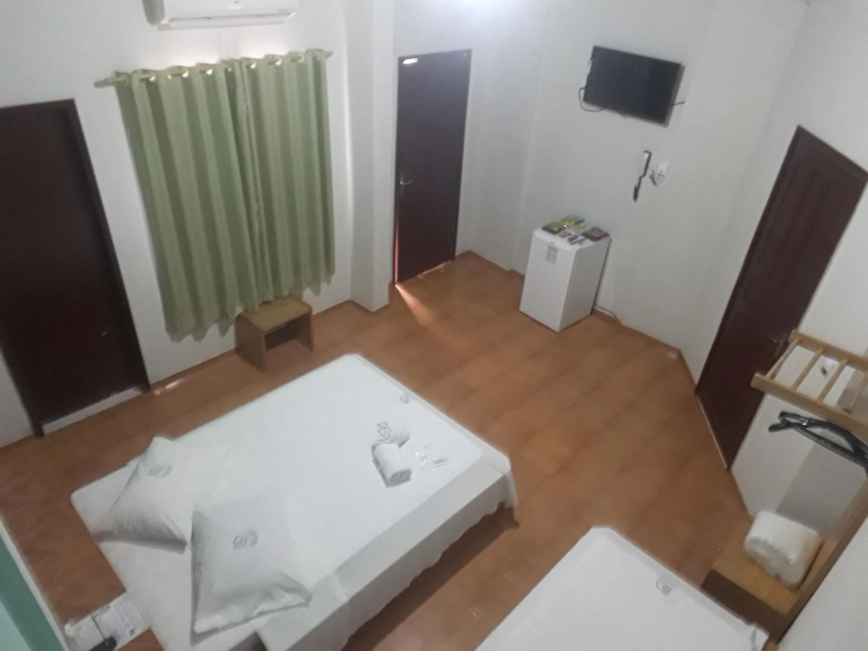 Bed in Hotel Chalé Ji-Parana