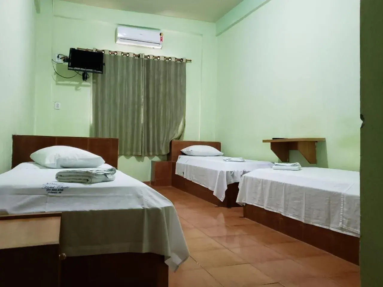 Triple Room in Hotel Chalé Ji-Parana Triple Room in Hotel Chalé Ji-Parana