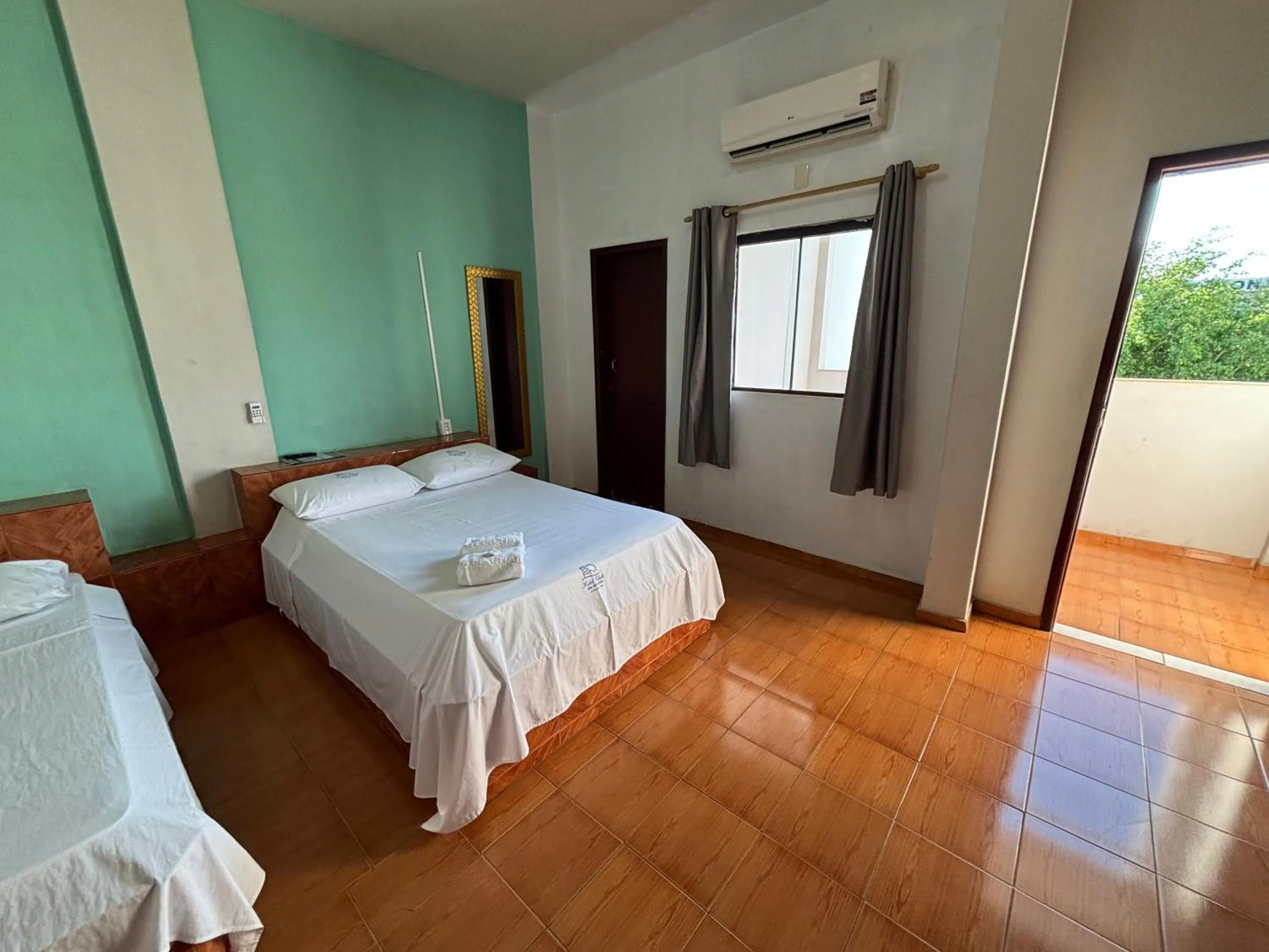 Bed in Hotel Chalé Ji-Parana