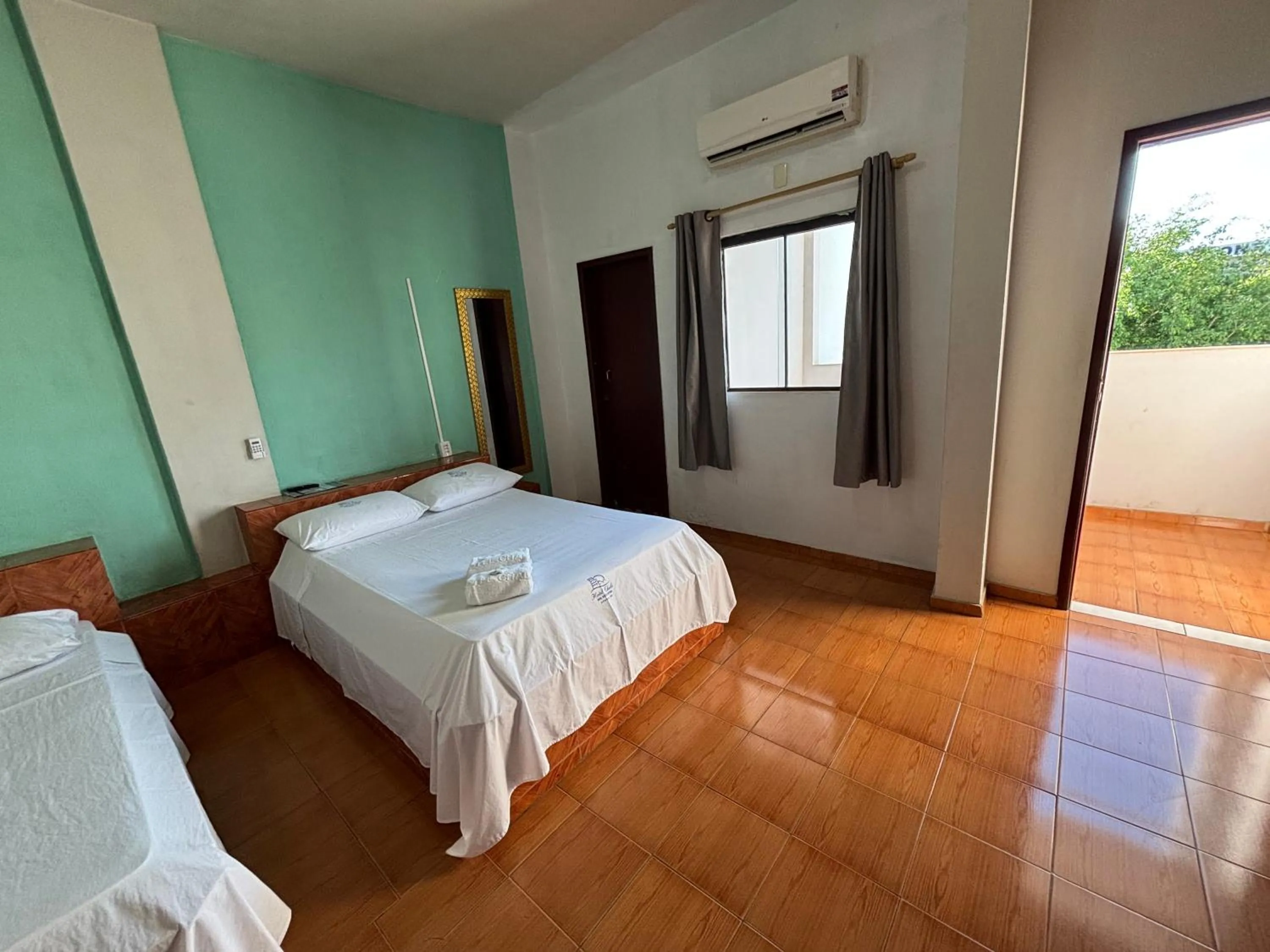 Bed in Hotel Chalé Ji-Parana