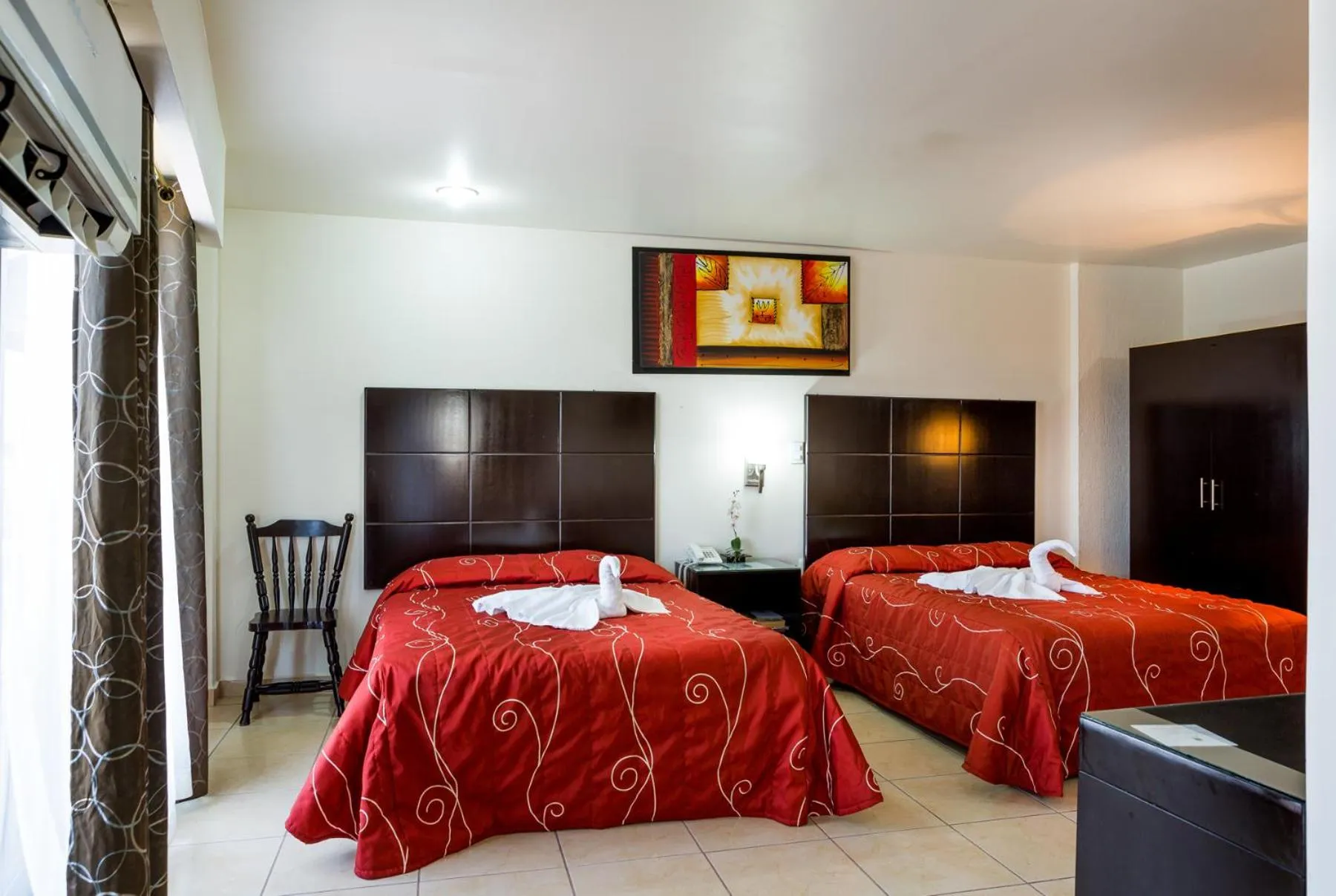 Bedroom in Hotel Raldos Inn