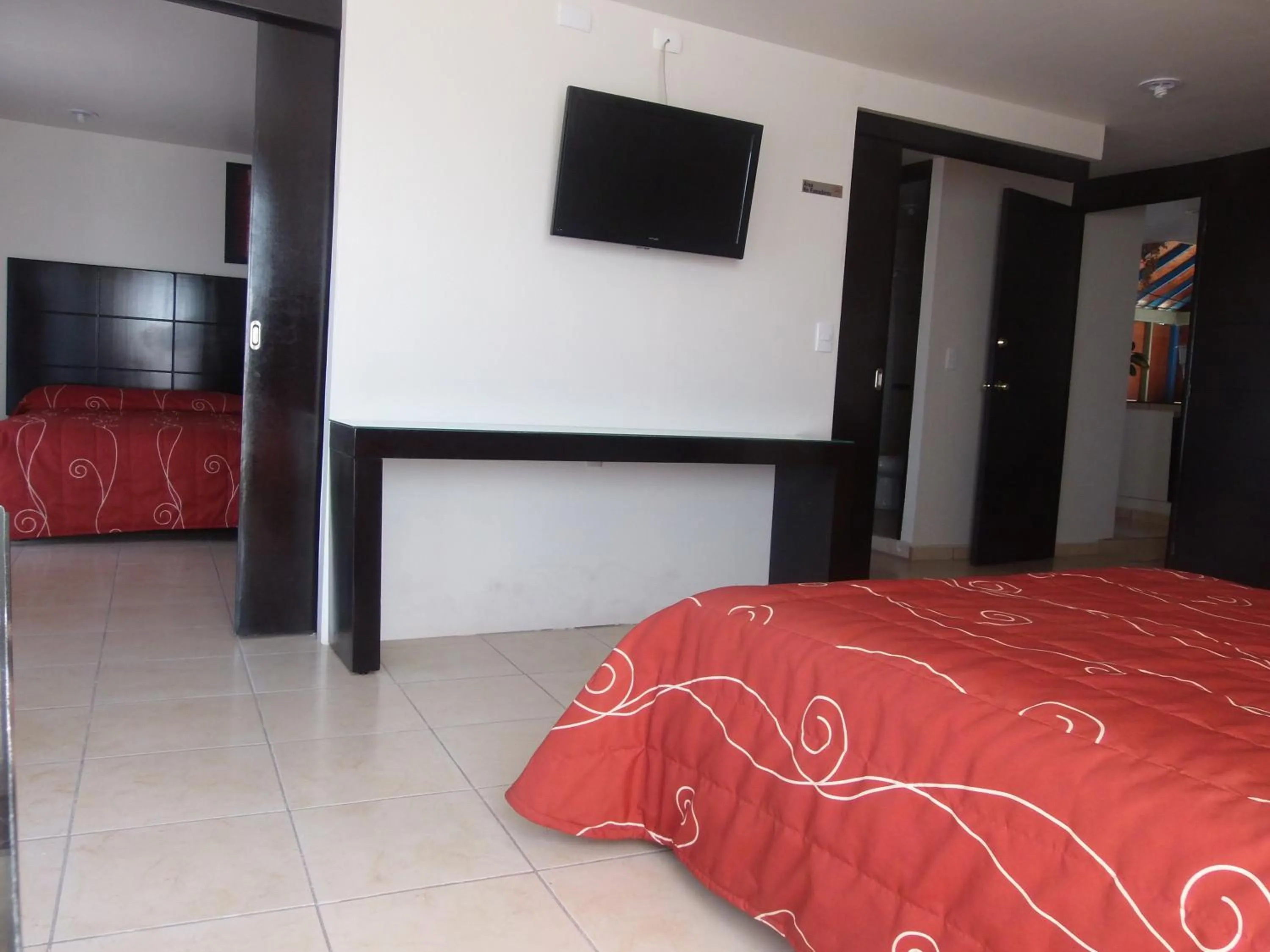 Bedroom in Hotel Raldos Inn