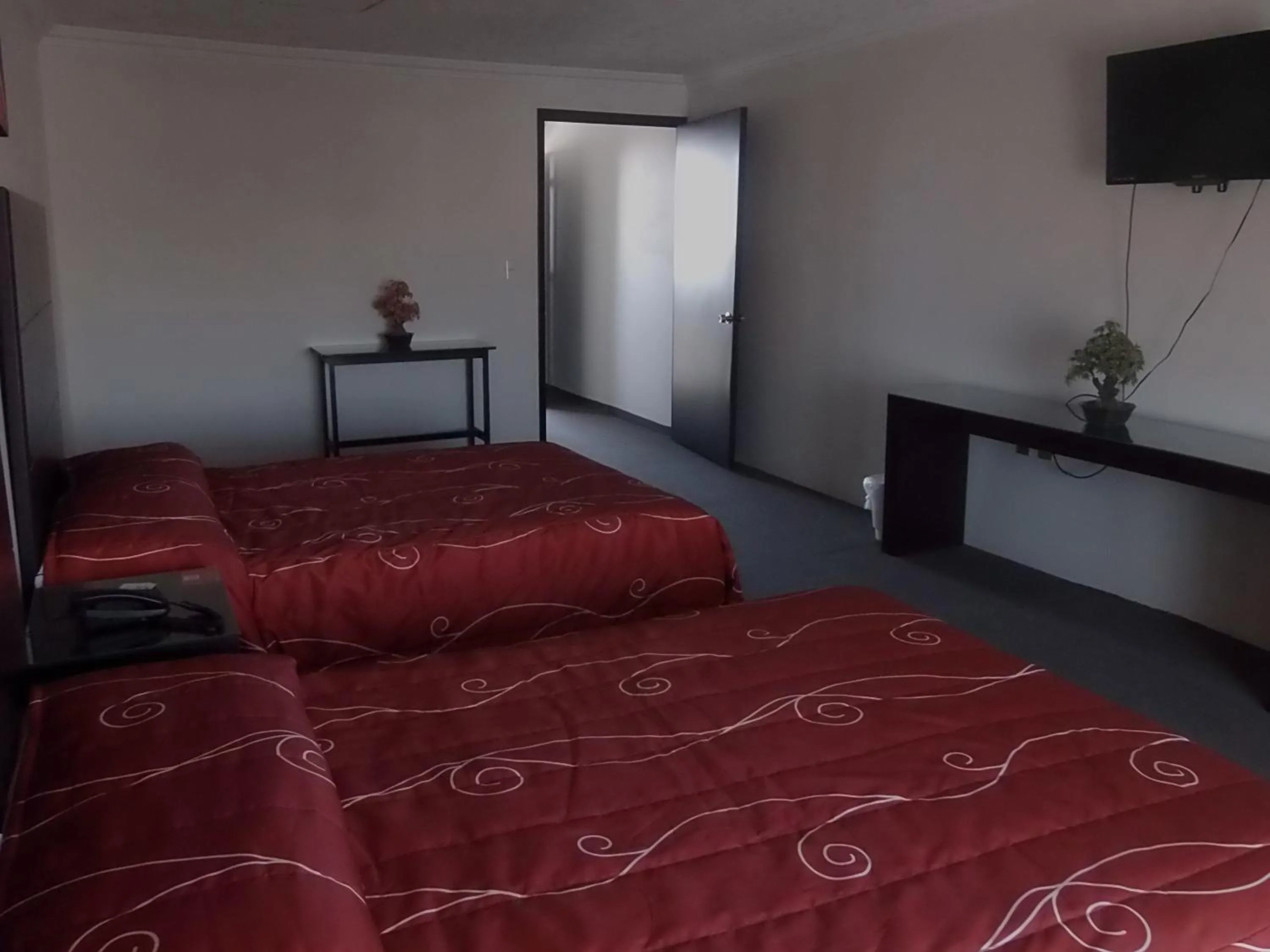 Bedroom in Hotel Raldos Inn