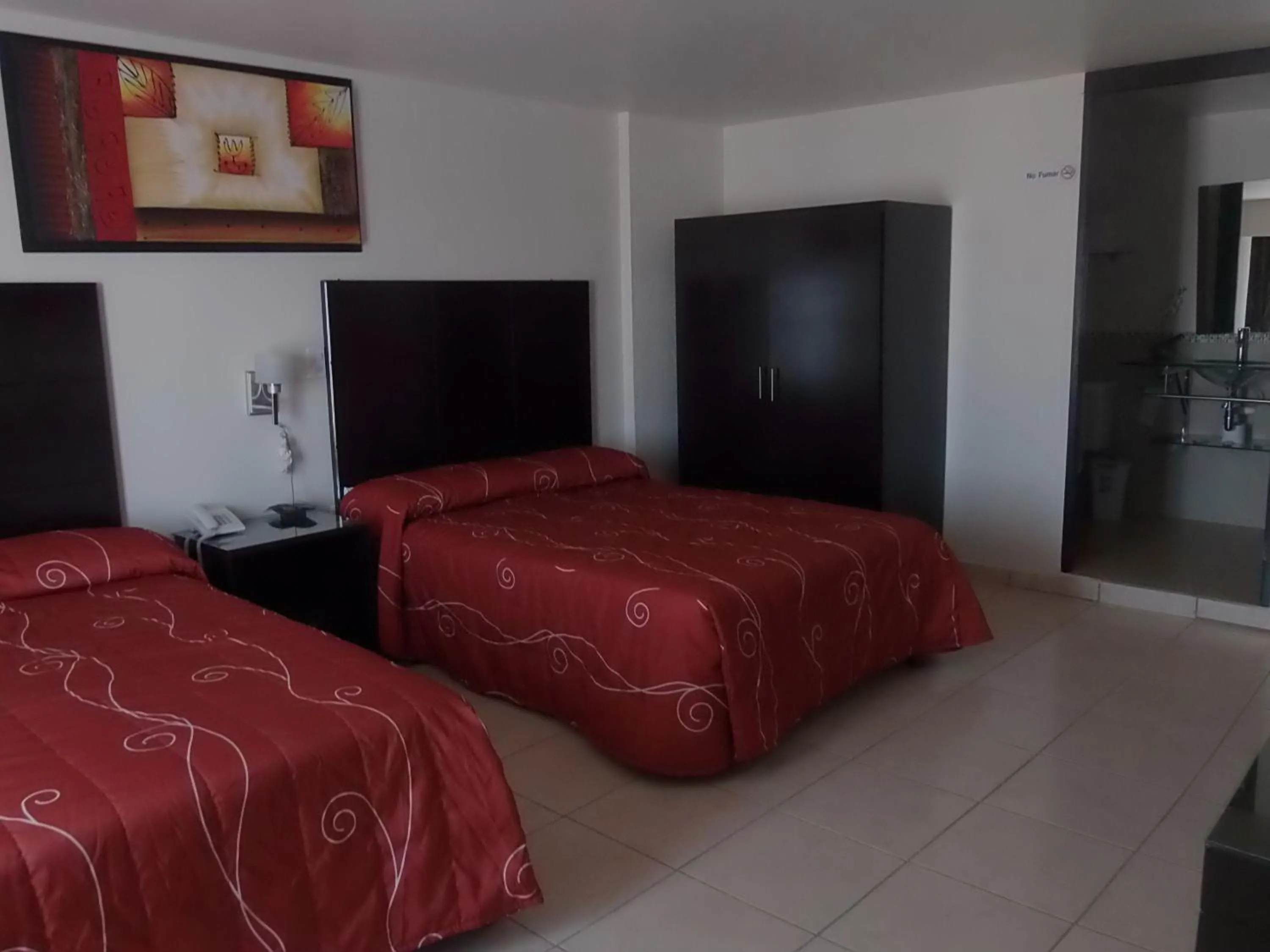 Bedroom in Hotel Raldos Inn