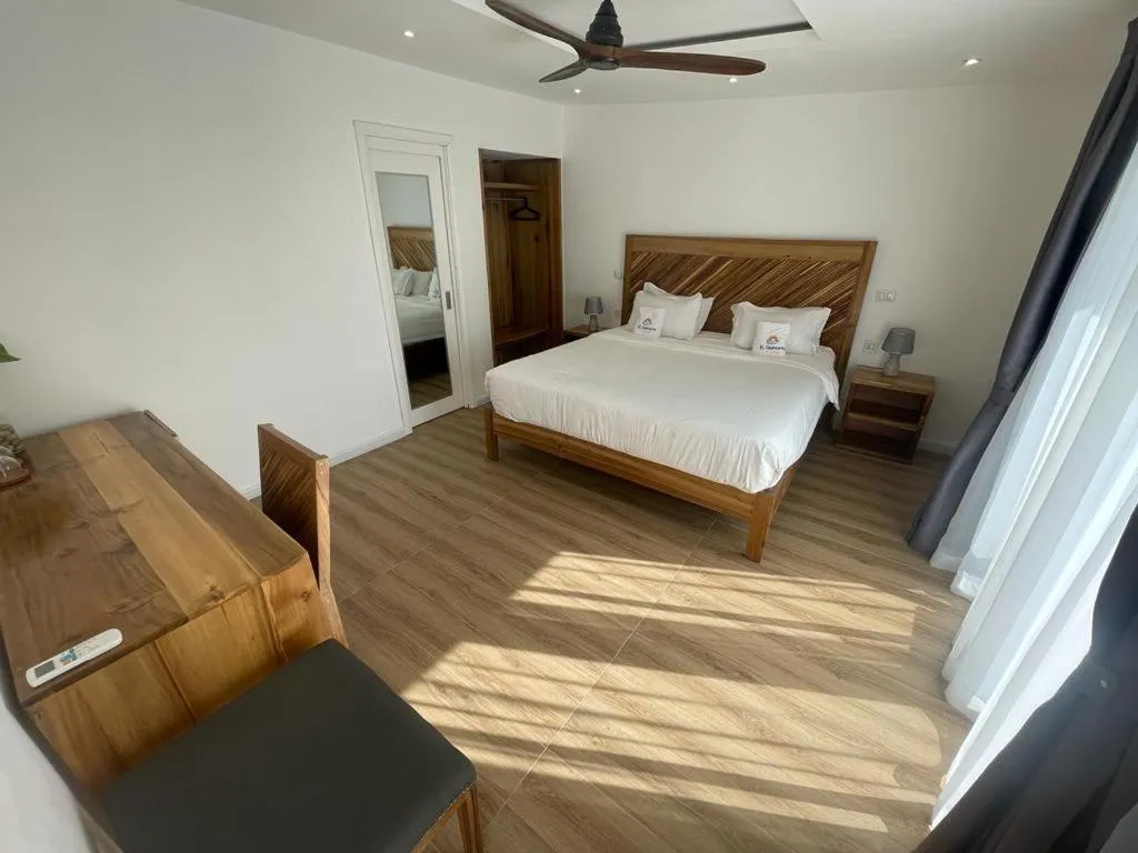 Bedroom, Bed in Hotel El Quemaito - Luxury Oceanfront Retreat