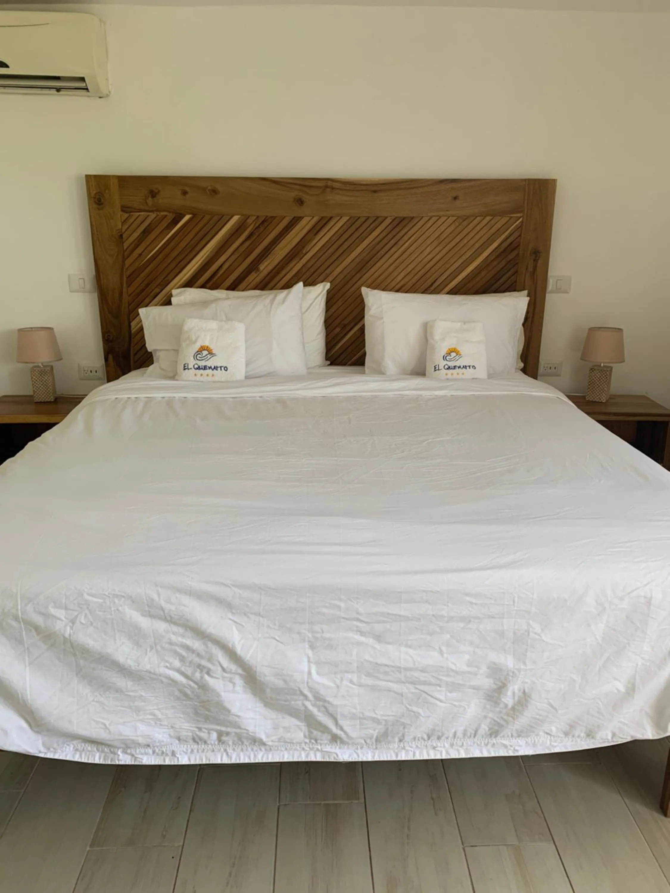 Bed in Hotel El Quemaito - Luxury Oceanfront Retreat