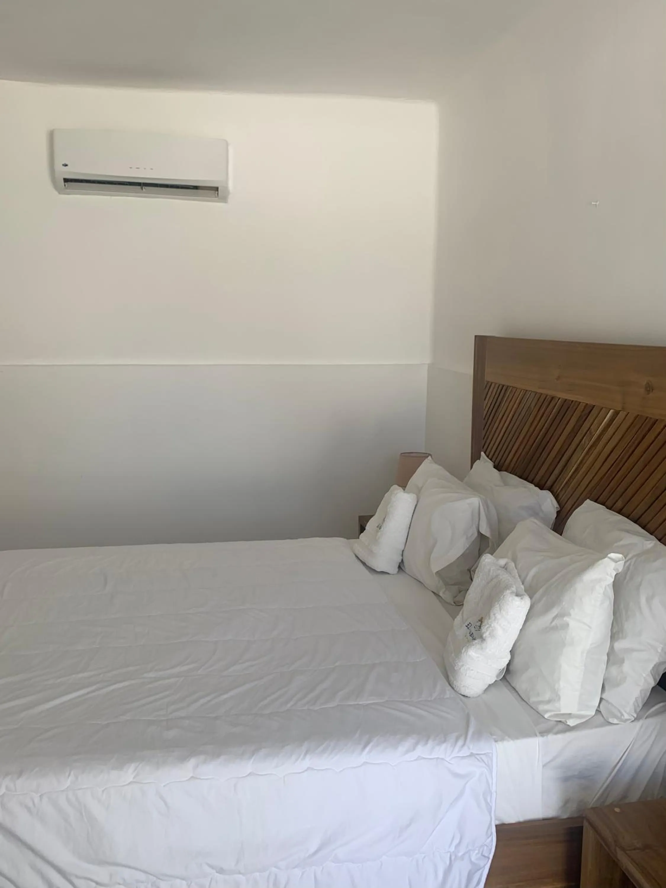 Bed in Hotel El Quemaito - Luxury Oceanfront Retreat