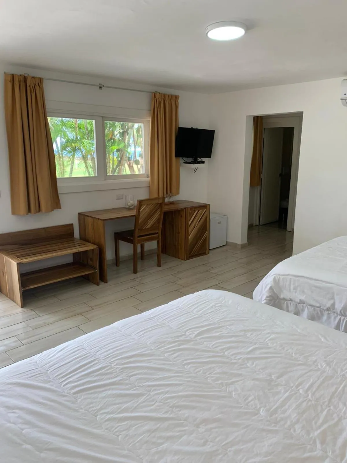 TV and multimedia, Bed in Hotel El Quemaito - Luxury Oceanfront Retreat