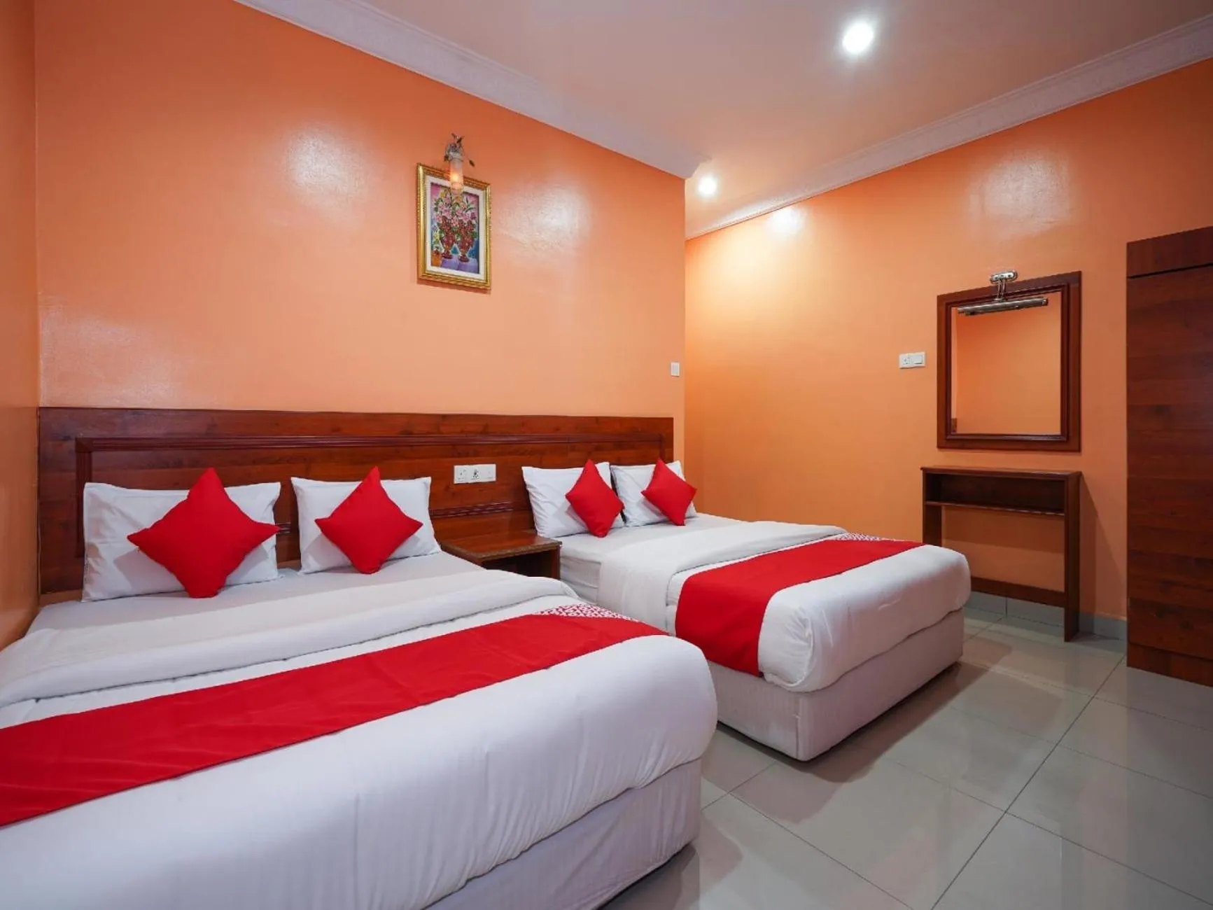 Bed in Bercam Times Inn Hotel