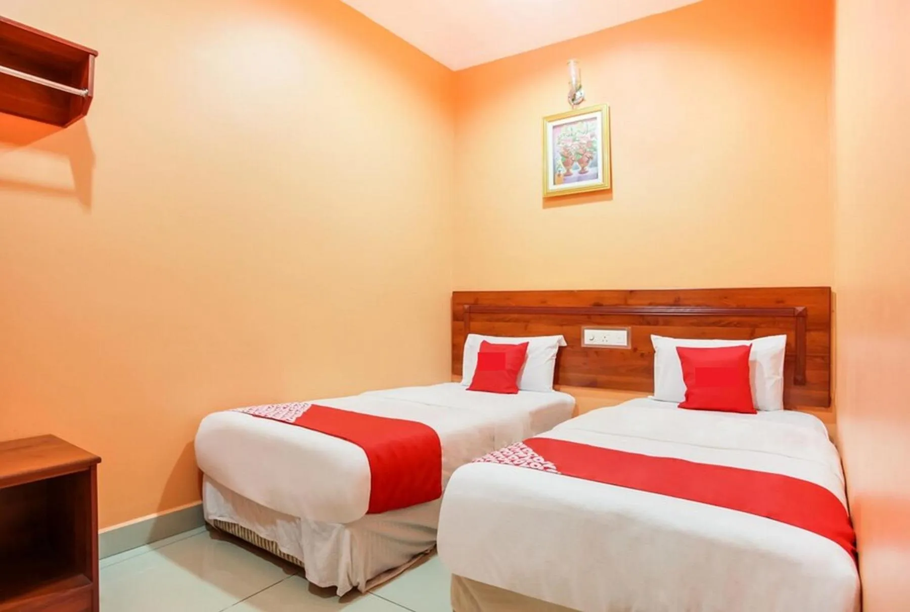 Bed in Bercam Times Inn Hotel