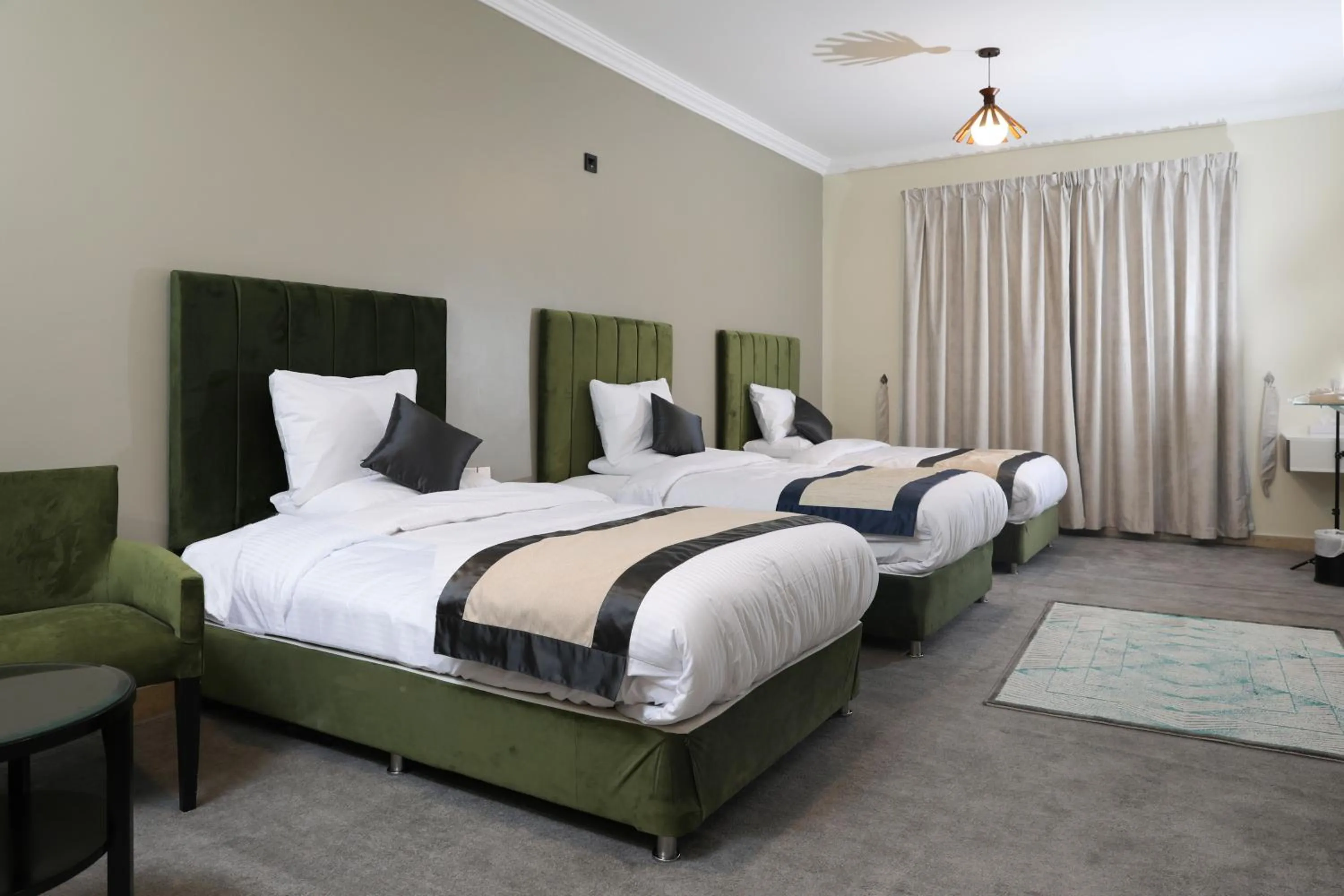 Bed in Sea Shore Hotel Apartment Khorfakkan