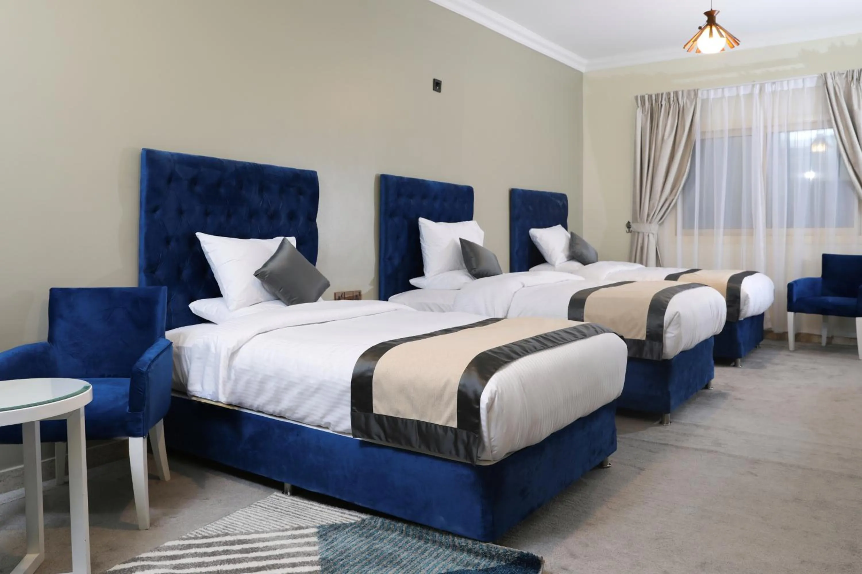 Photo of the whole room, Bed in Sea Shore Hotel Apartment Khorfakkan