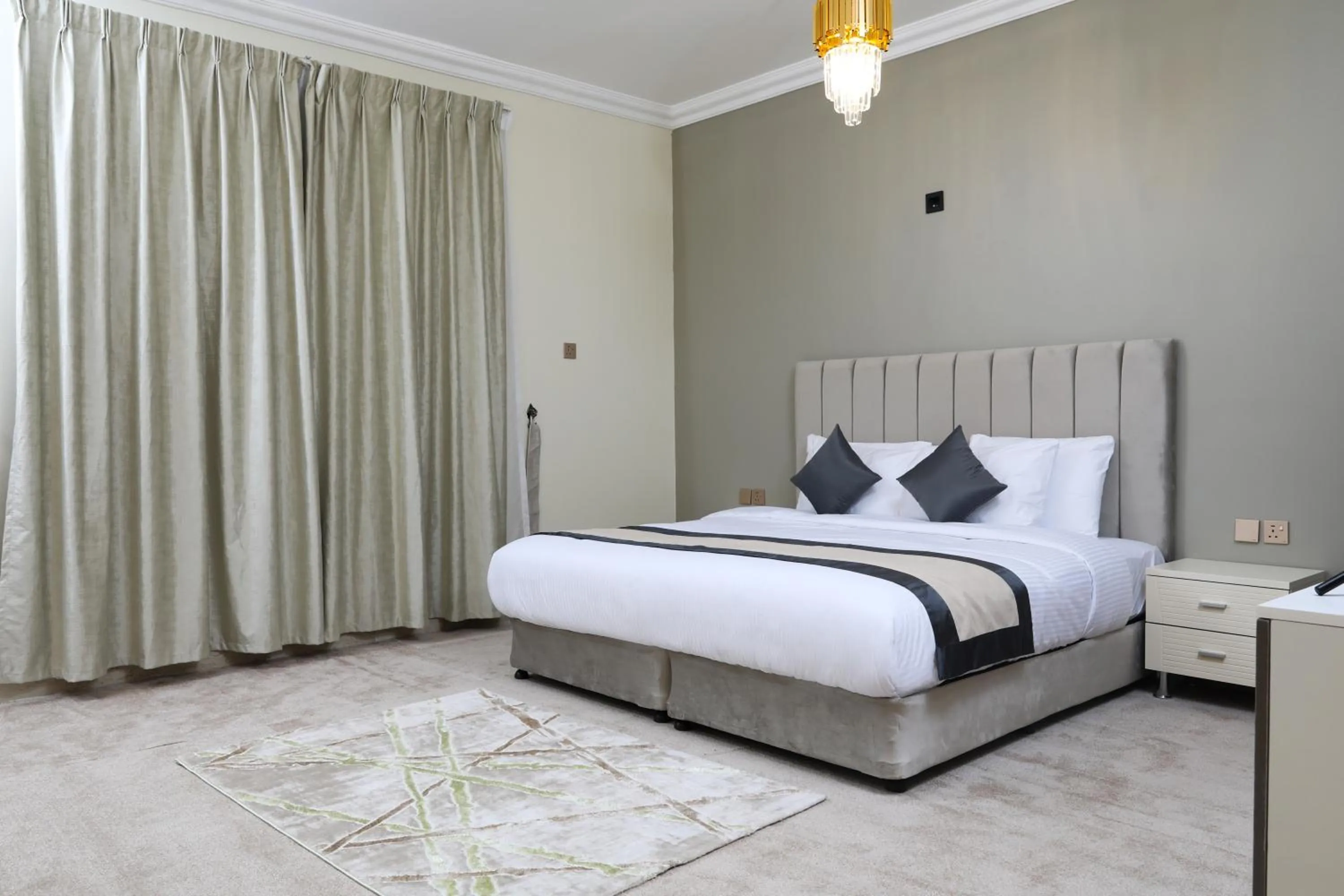 Bed in Sea Shore Hotel Apartment Khorfakkan