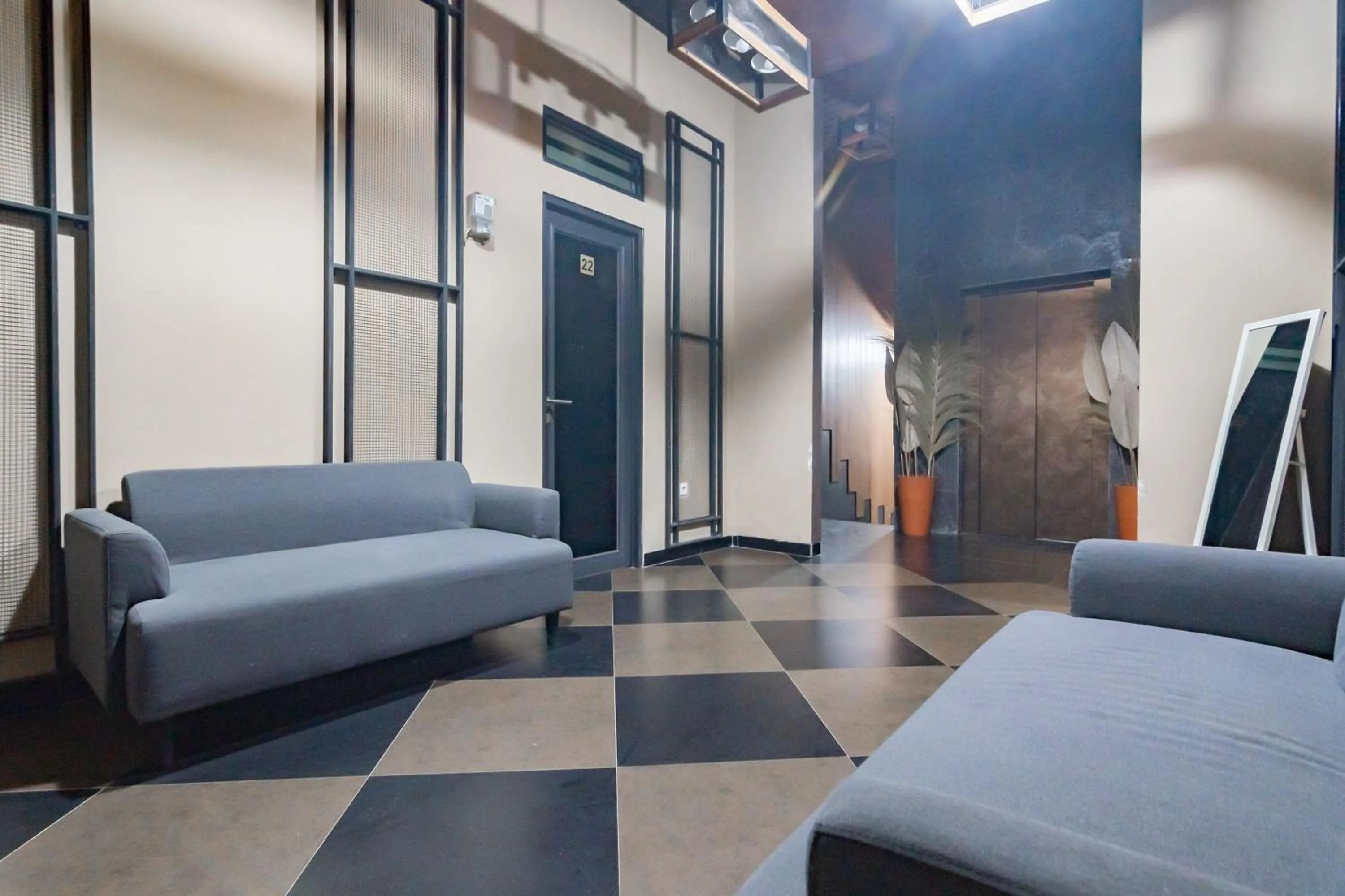 Living room in Urbanview Elephant Eleven Residence Buah Batu Bandung by RedDoorz