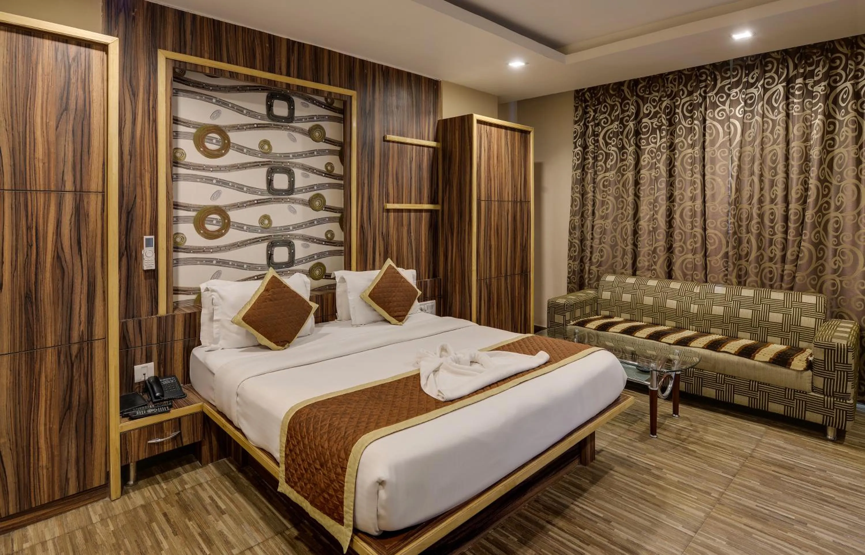 Photo of the whole room, Bed in The Royal Melange Beacon