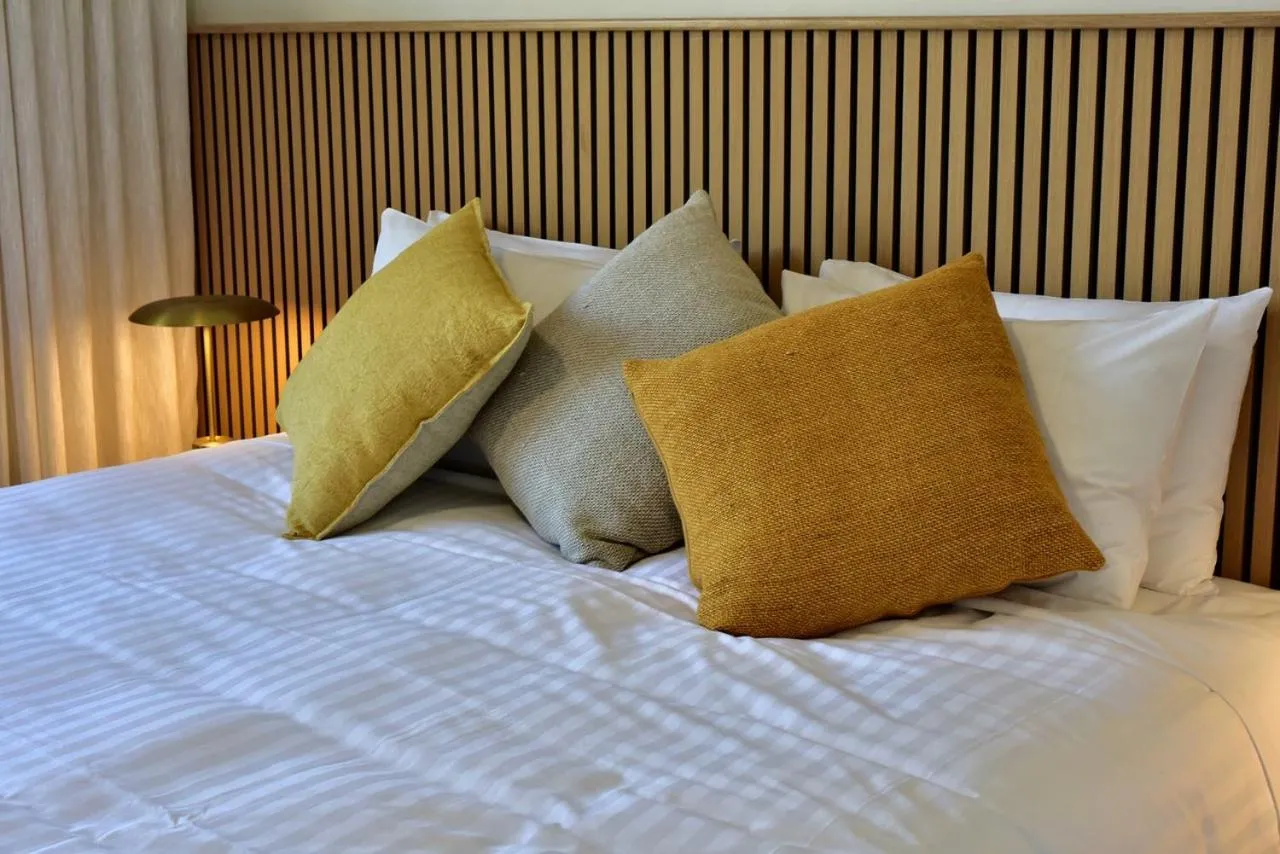 Bed in Lufra Beachside Hotel