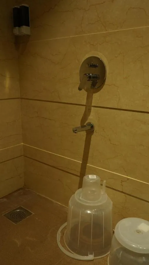 Bathroom in Alaukik Hotel