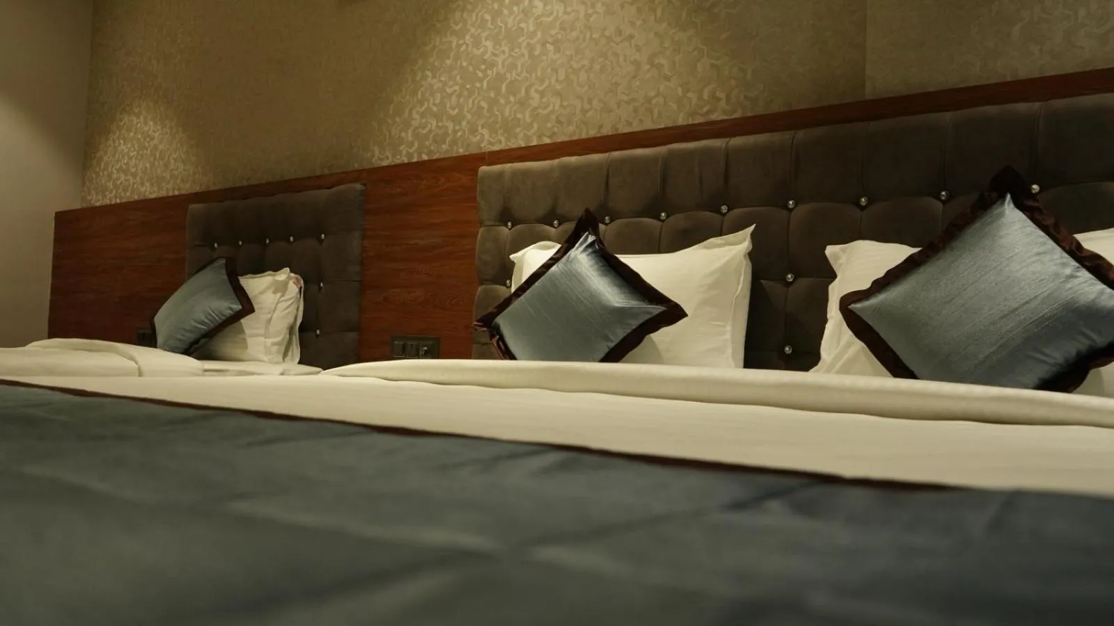 Bed in Alaukik Hotel