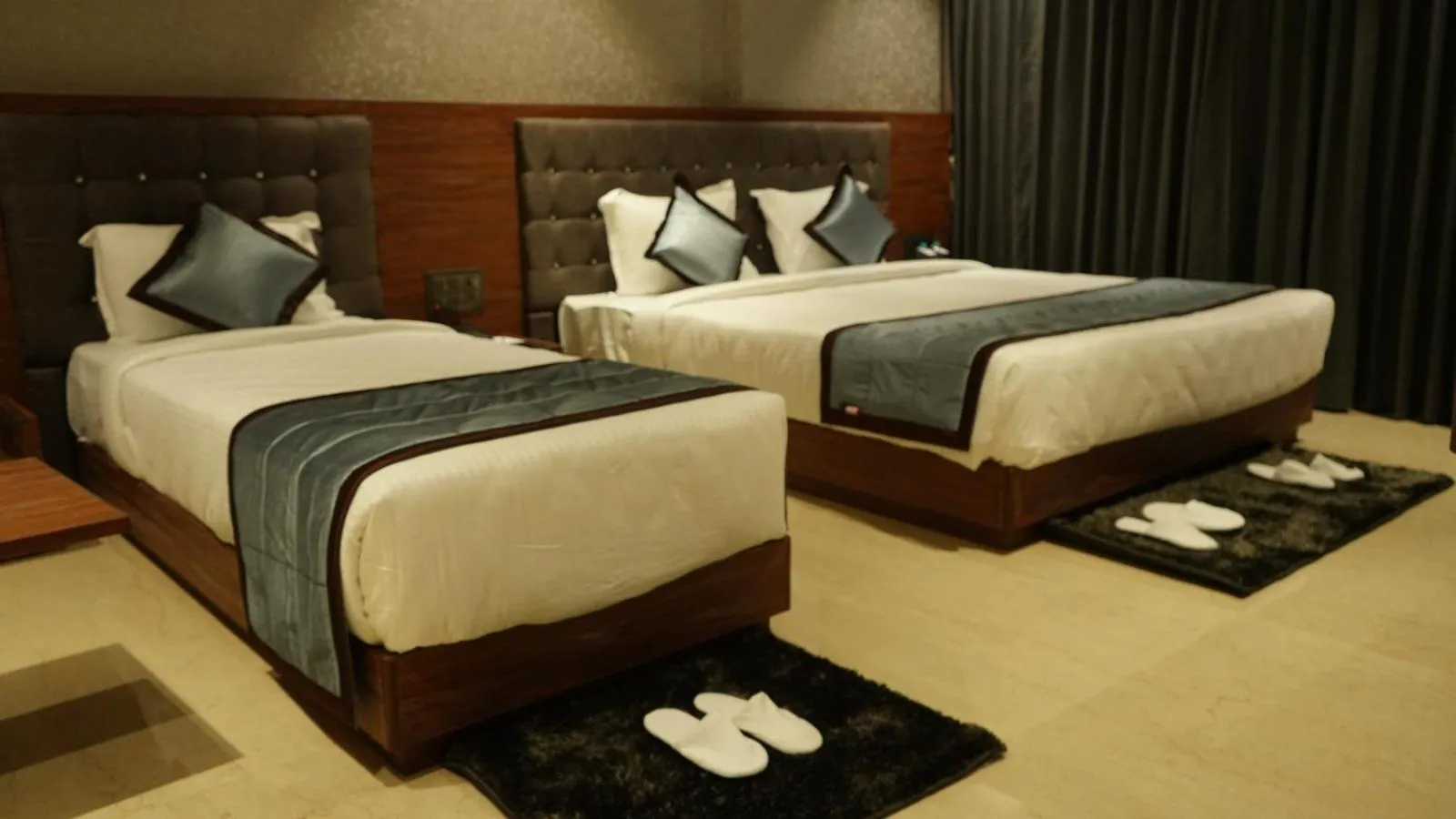 Bed in Alaukik Hotel