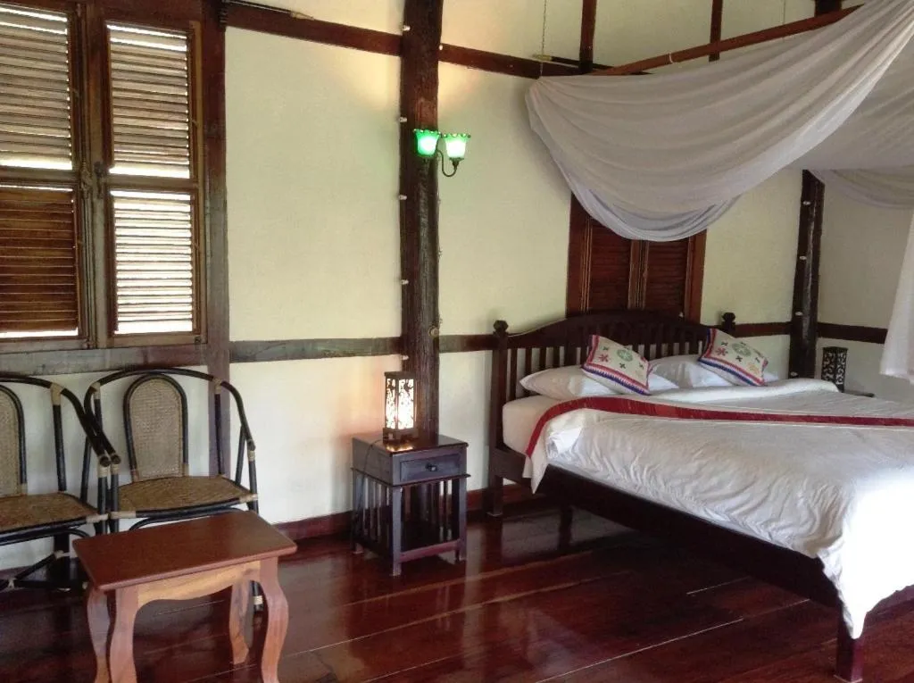 Photo of the whole room, Bed in Lao Spirit Resort