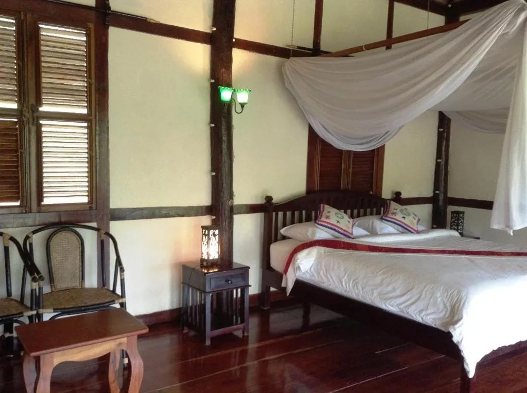 Photo of the whole room, Bed in Lao Spirit Resort