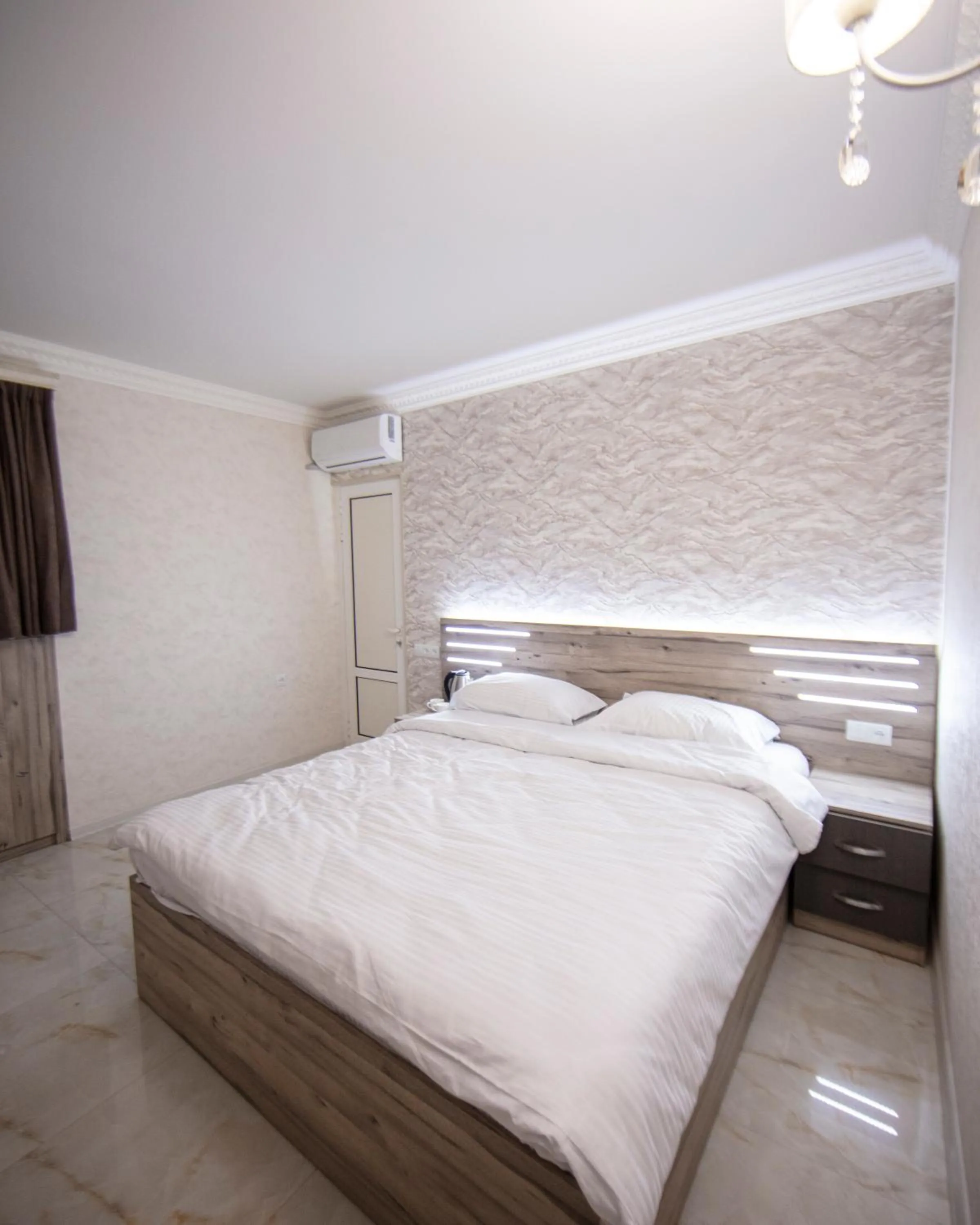 Bed in Opera Avenue Hotel