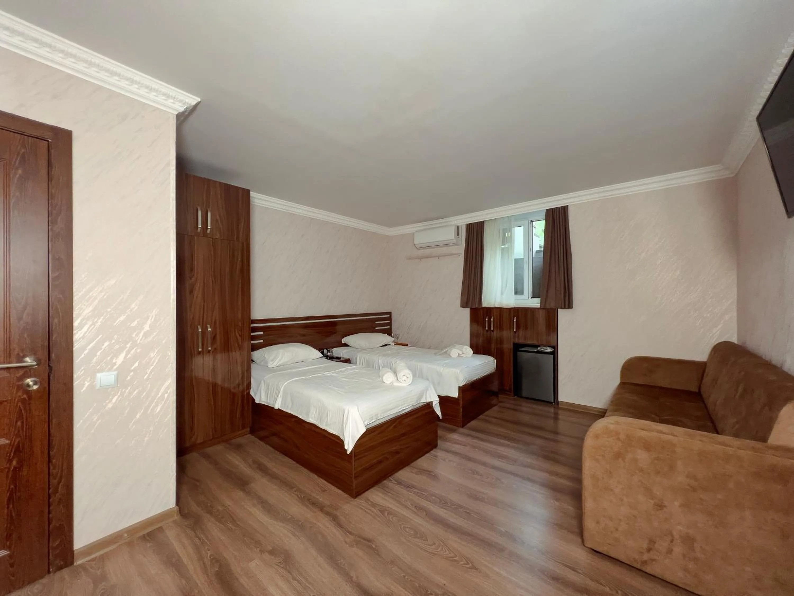 Bed in Opera Avenue Hotel