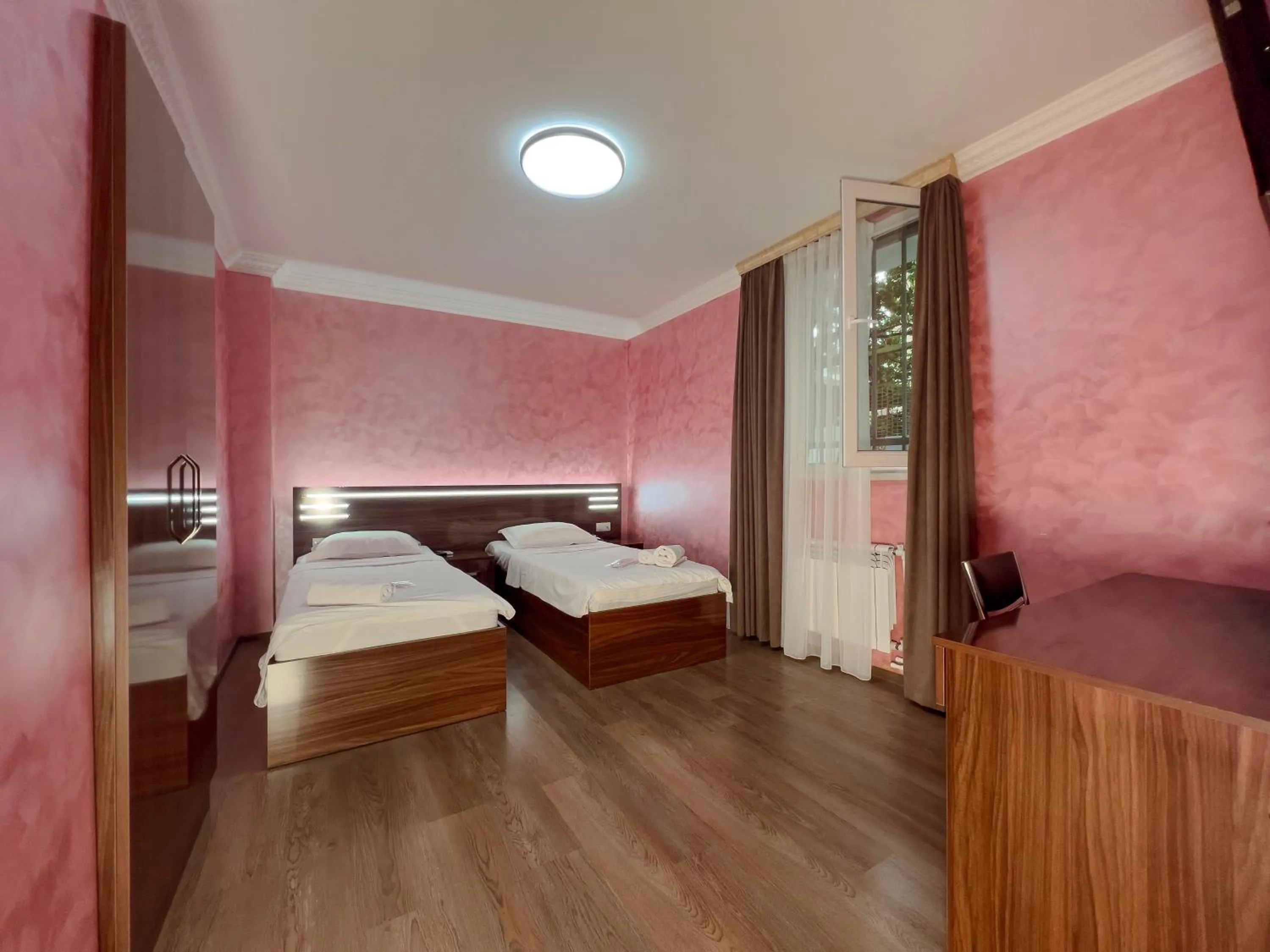 Bed in Opera Avenue Hotel