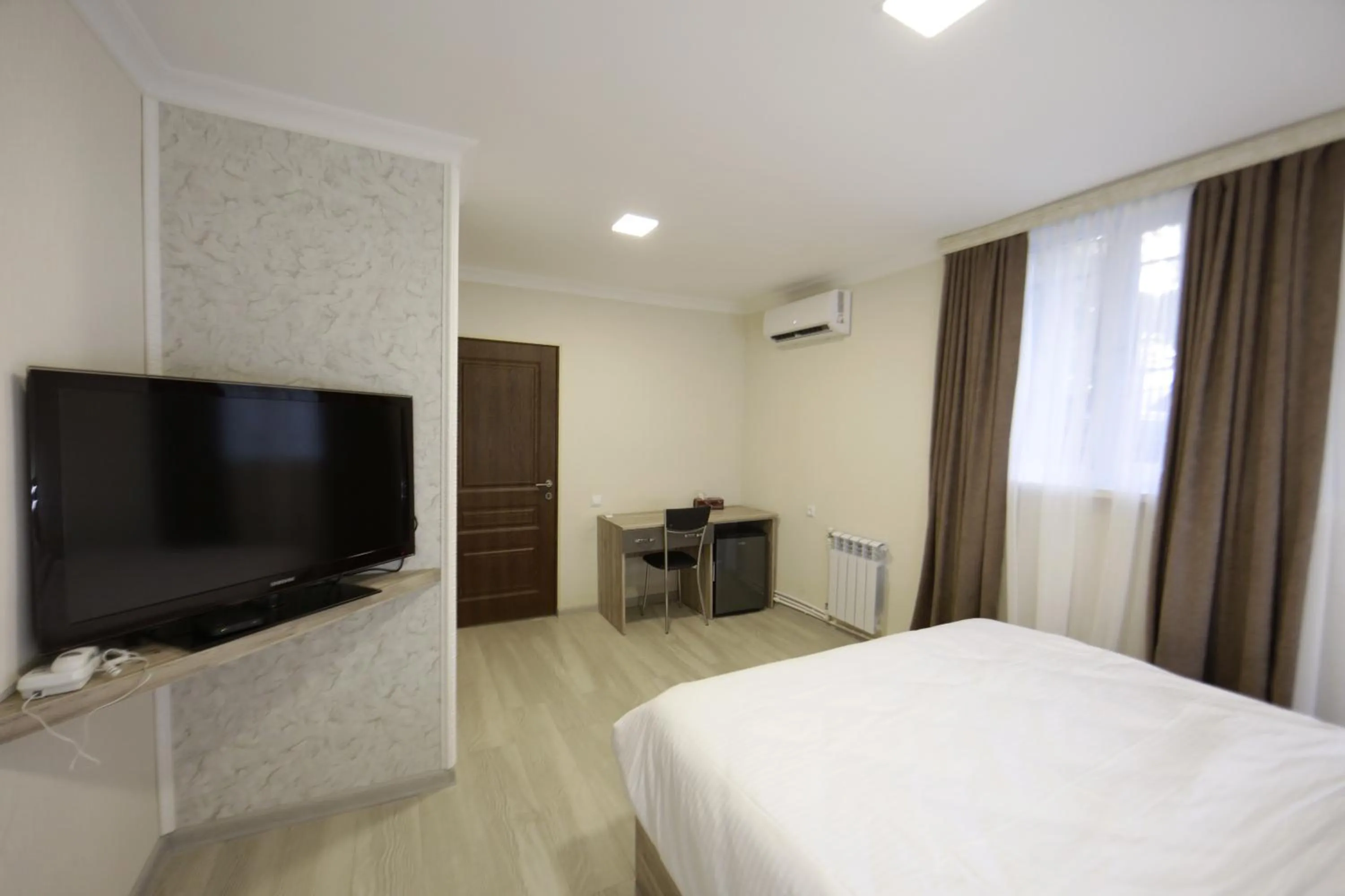 Bed in Opera Avenue Hotel