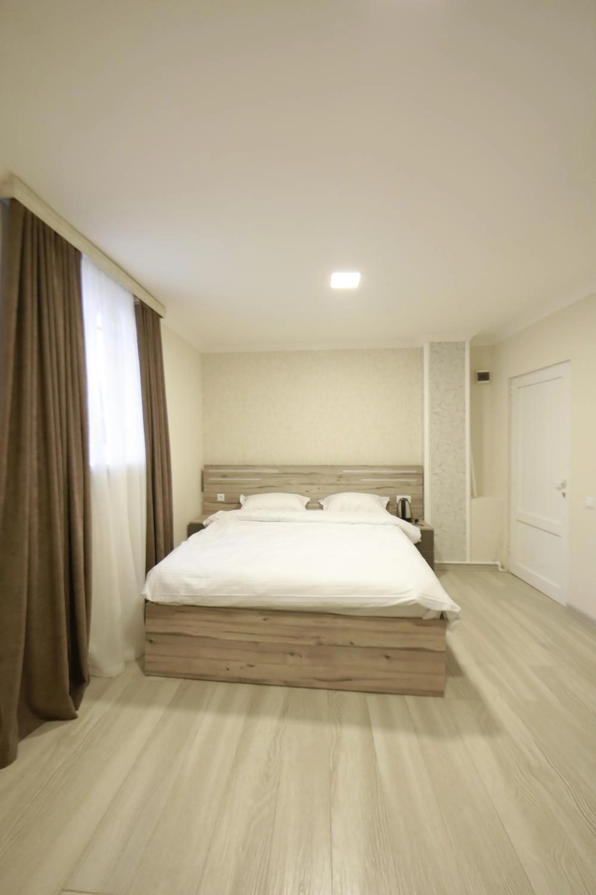 Bed in Opera Avenue Hotel