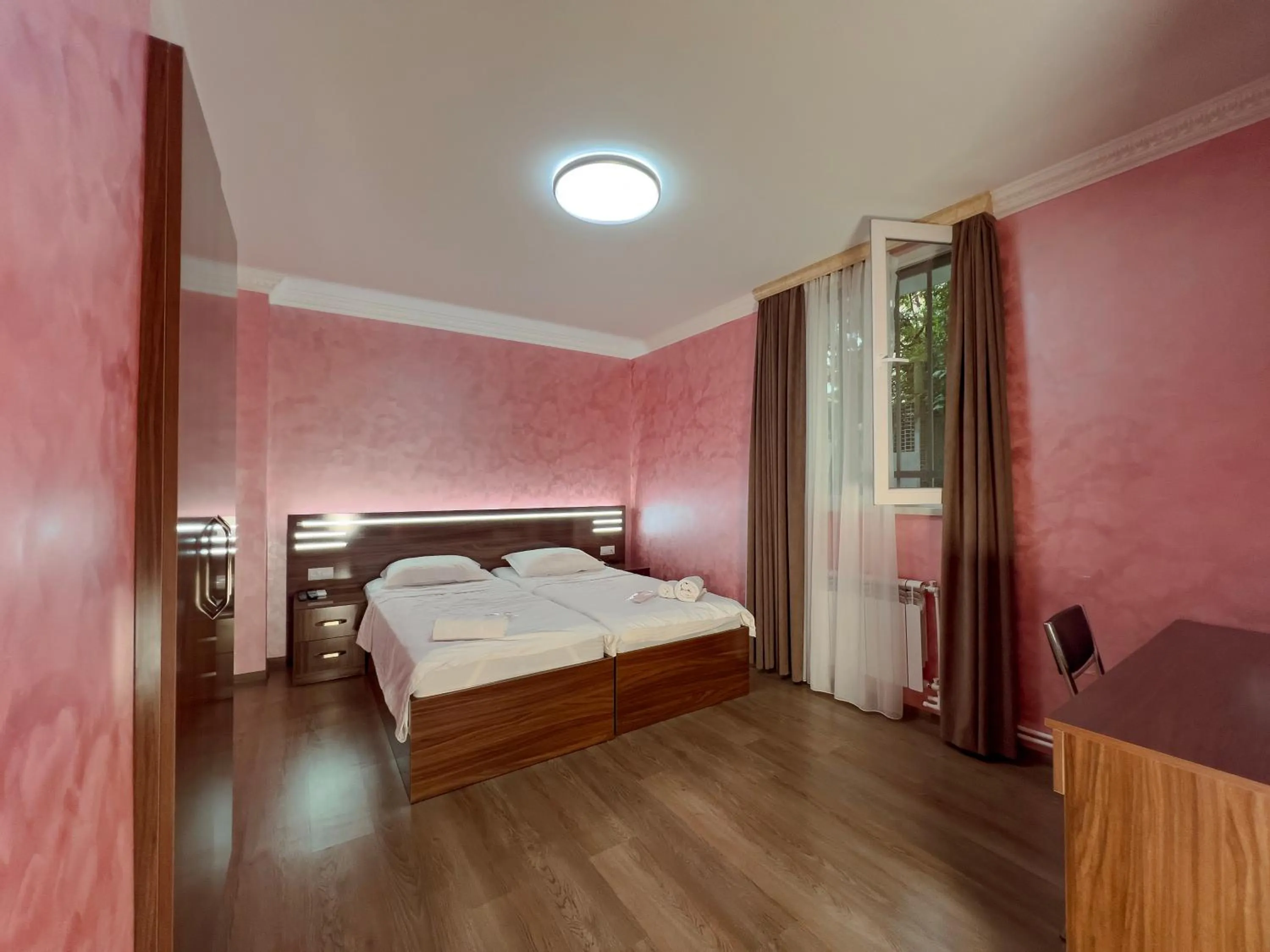 Bed in Opera Avenue Hotel