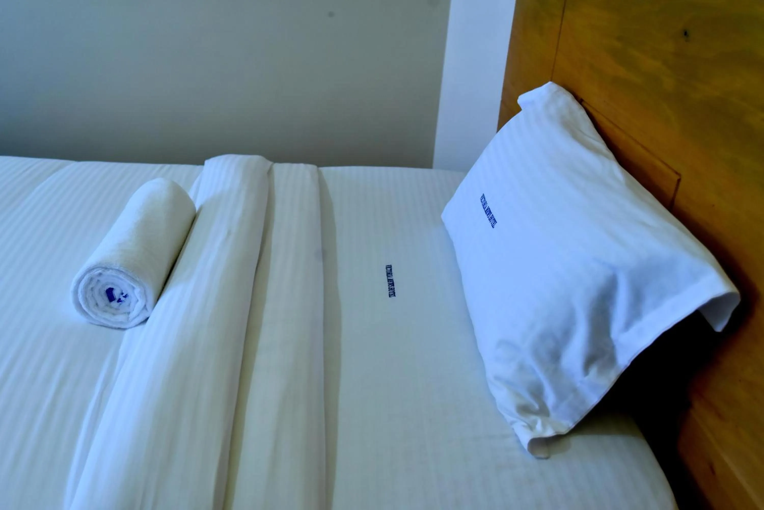 Bed in Victoria Mews Hotel