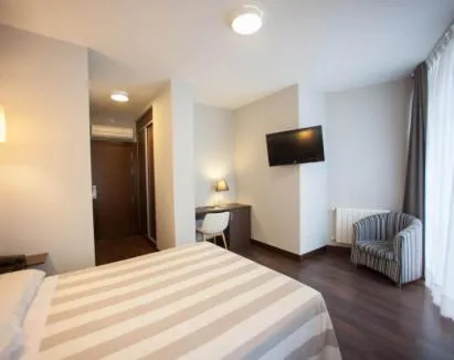 Bed in Hotel Silken Sirimiri