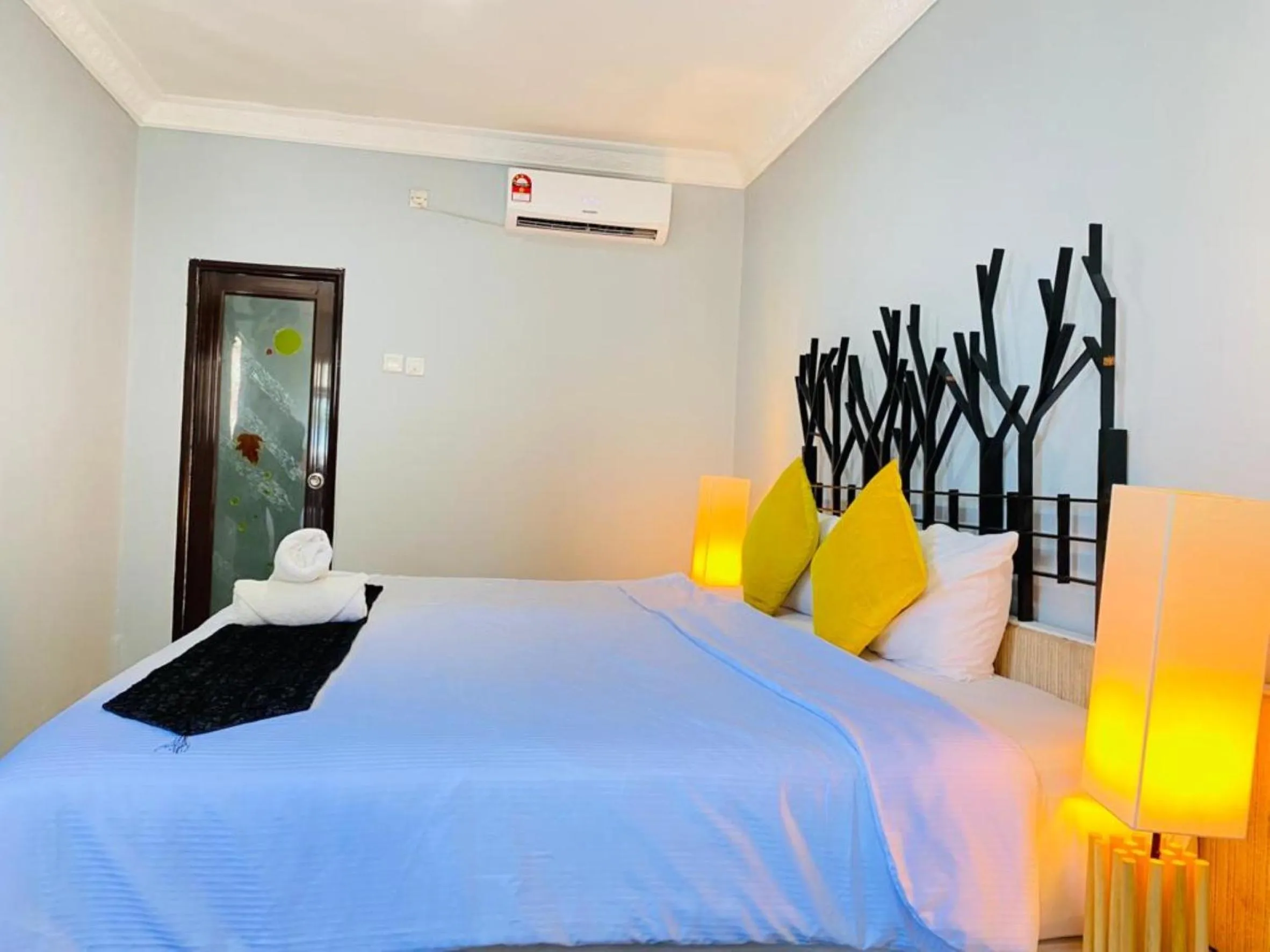 Bed in FAT MERMAID GUESTHOUSE