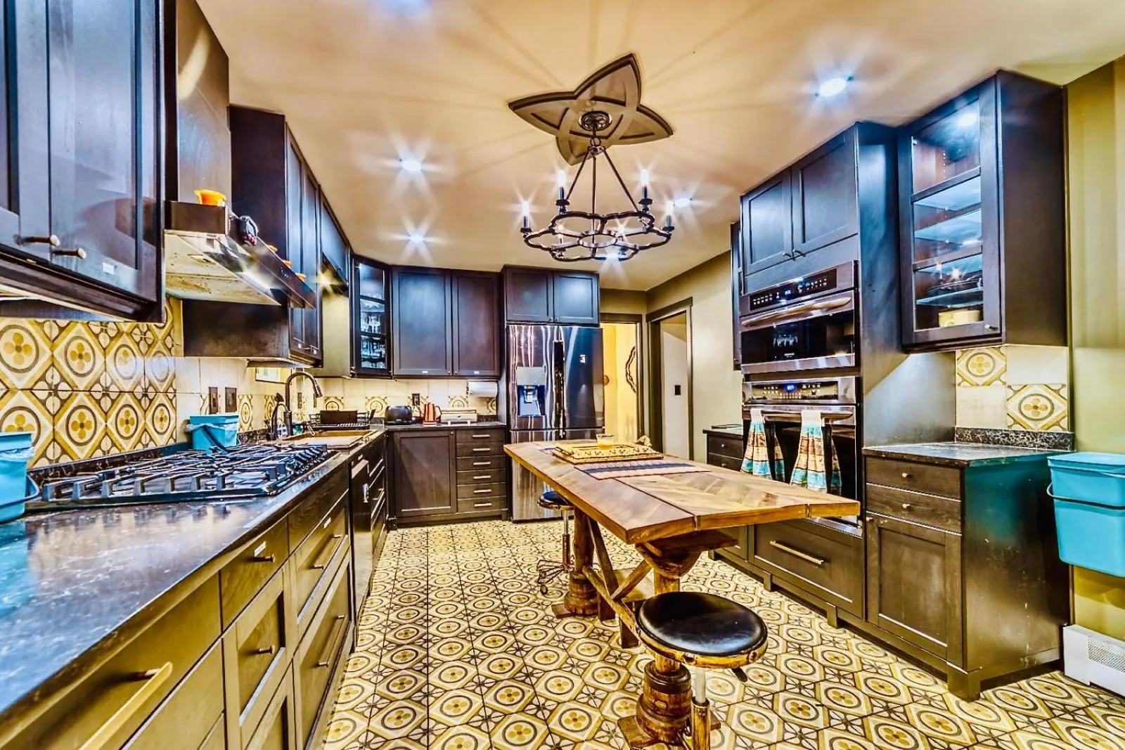 Communal kitchen in Neocolonial Nouveau Kensington Vacation Home